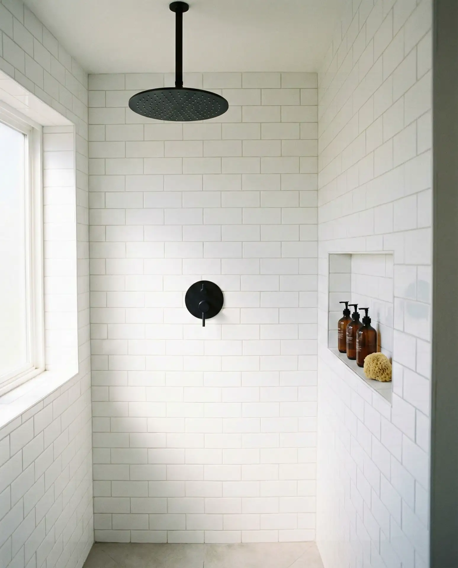 Black Fixtures Against White Tile 1