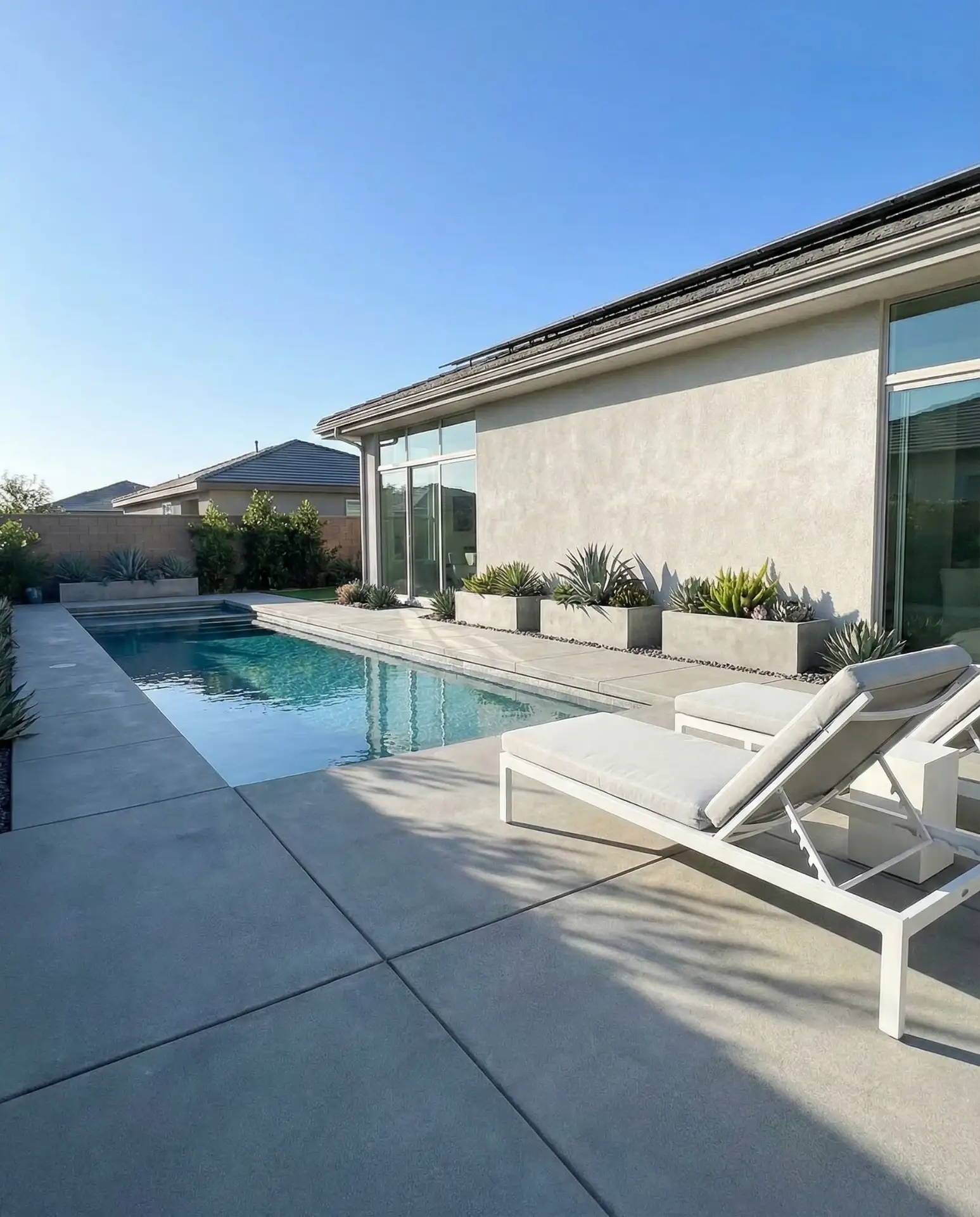 Geometric Pool with Modern Paver Deck 1