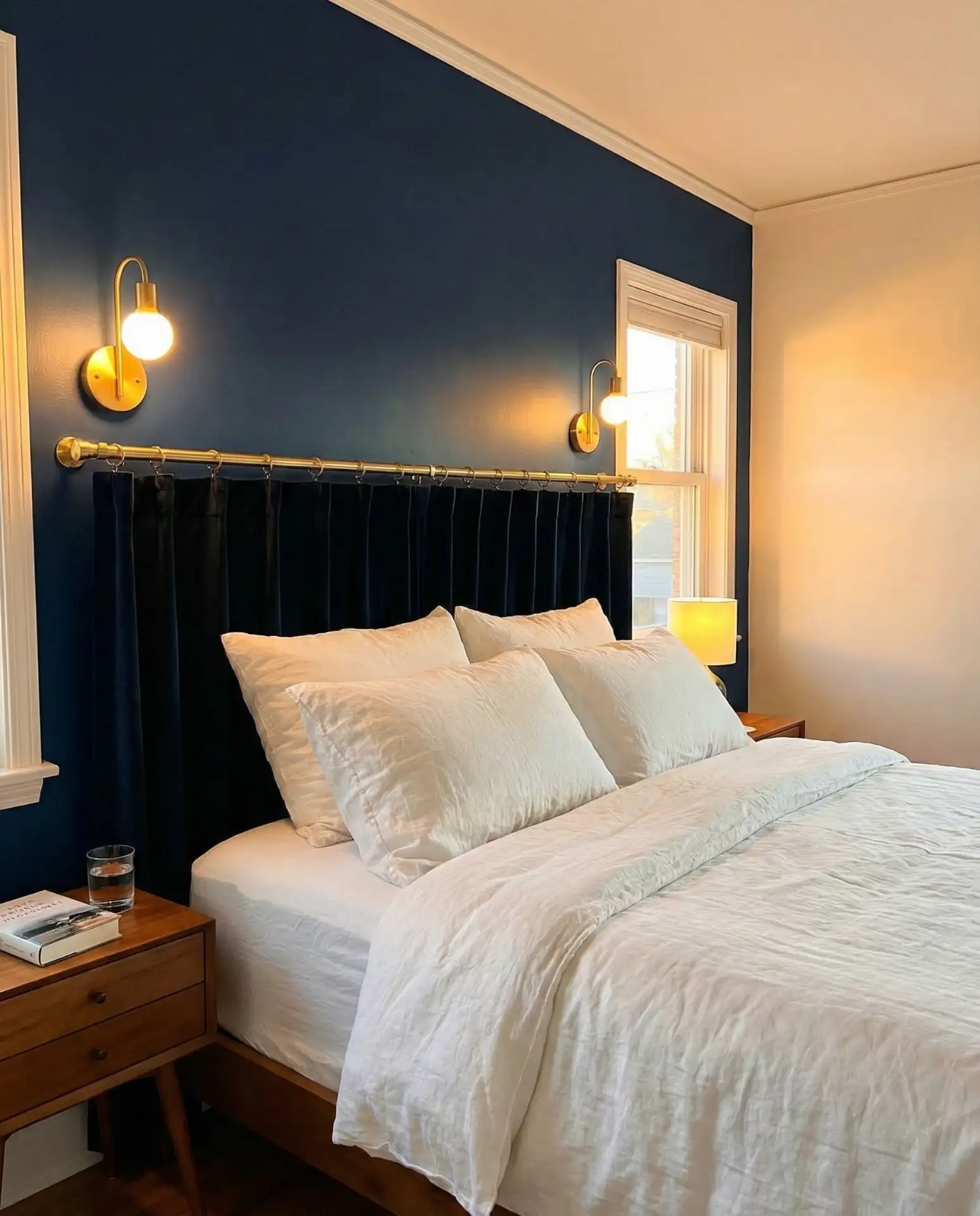 Navy Blue Accent Wall with Brass Fixtures 1