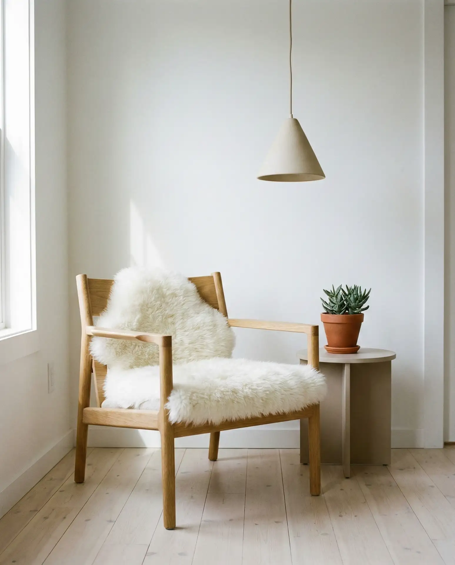 Scandinavian Corner with Sheepskin Throw and Pendant Light 2