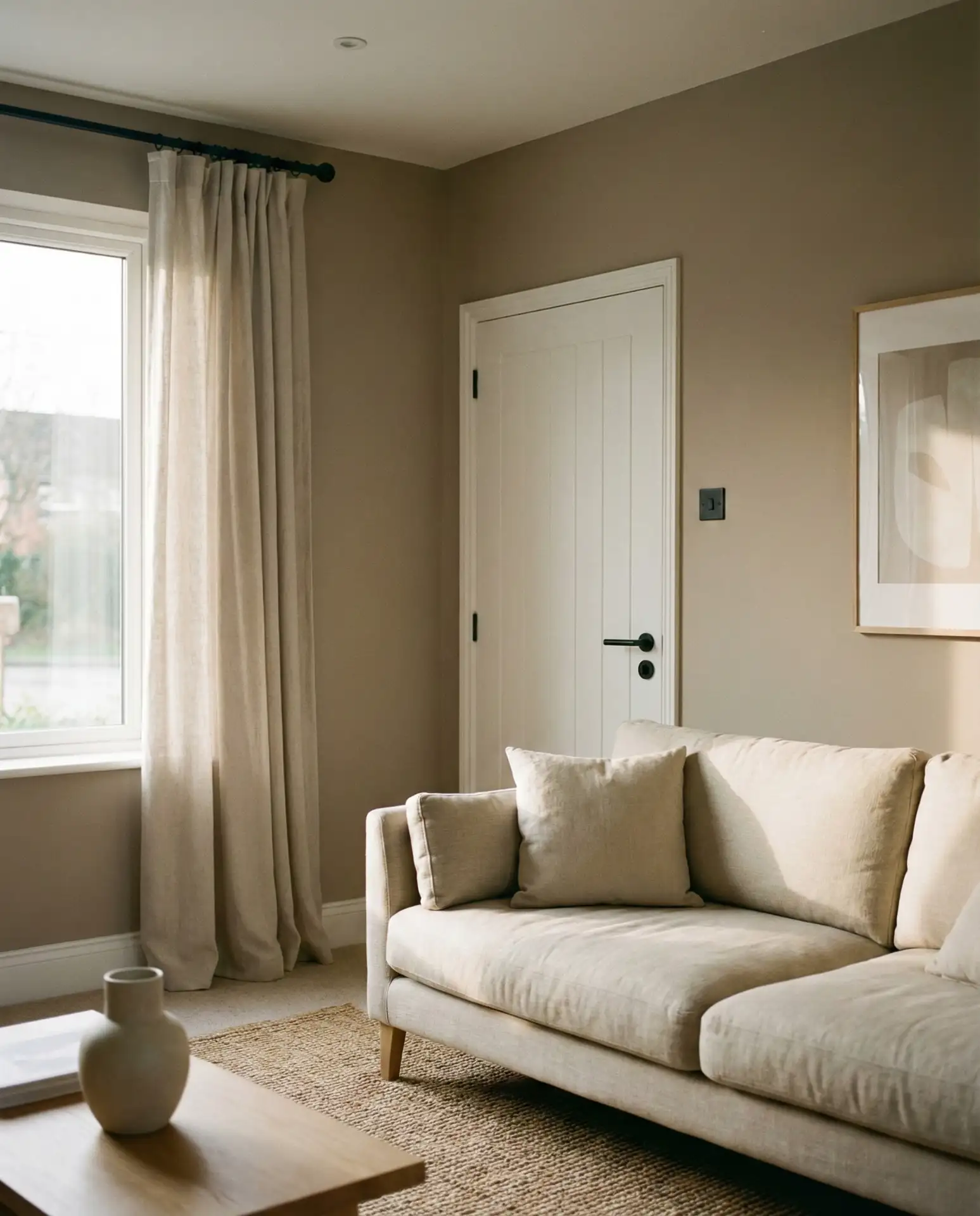 Warm Taupe Walls with Black Hardware 1