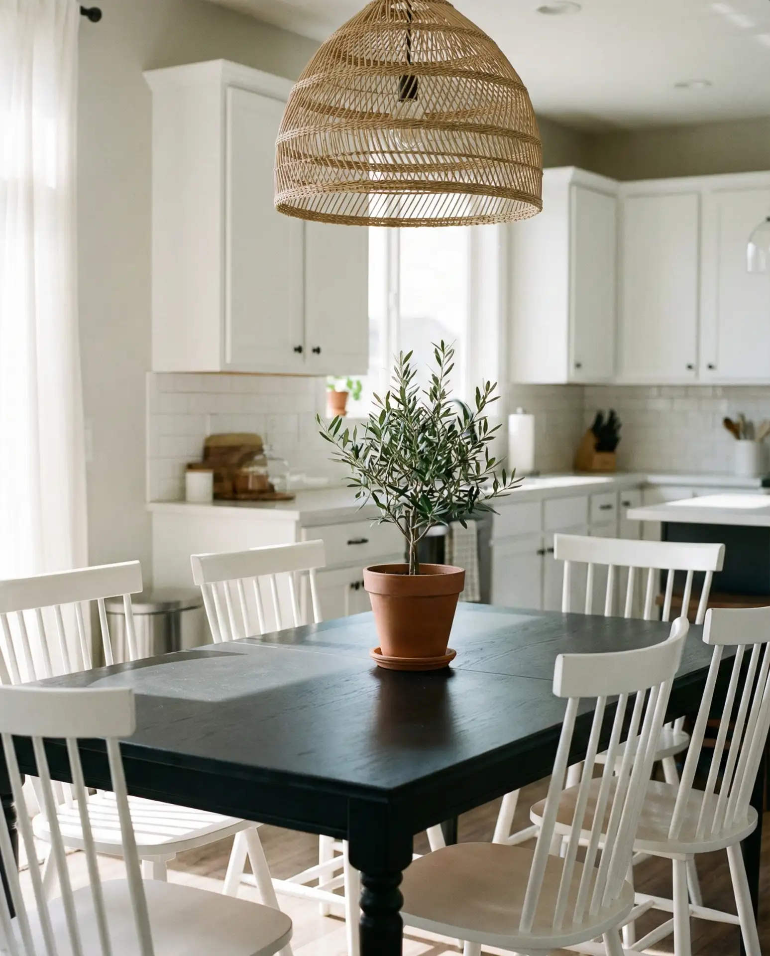 Black Dining Table in an Eat-In Kitchen 1