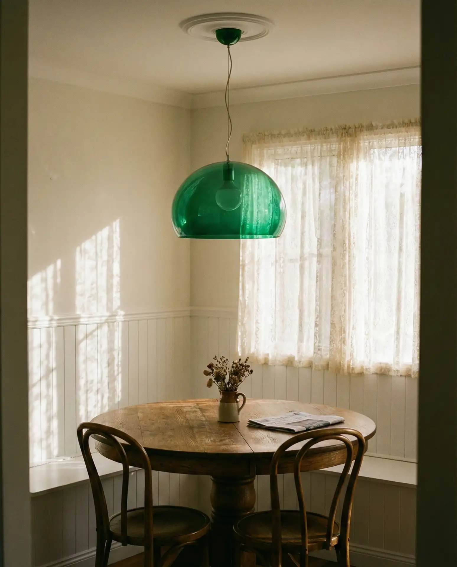 Green Glass Dome Shades Over Table