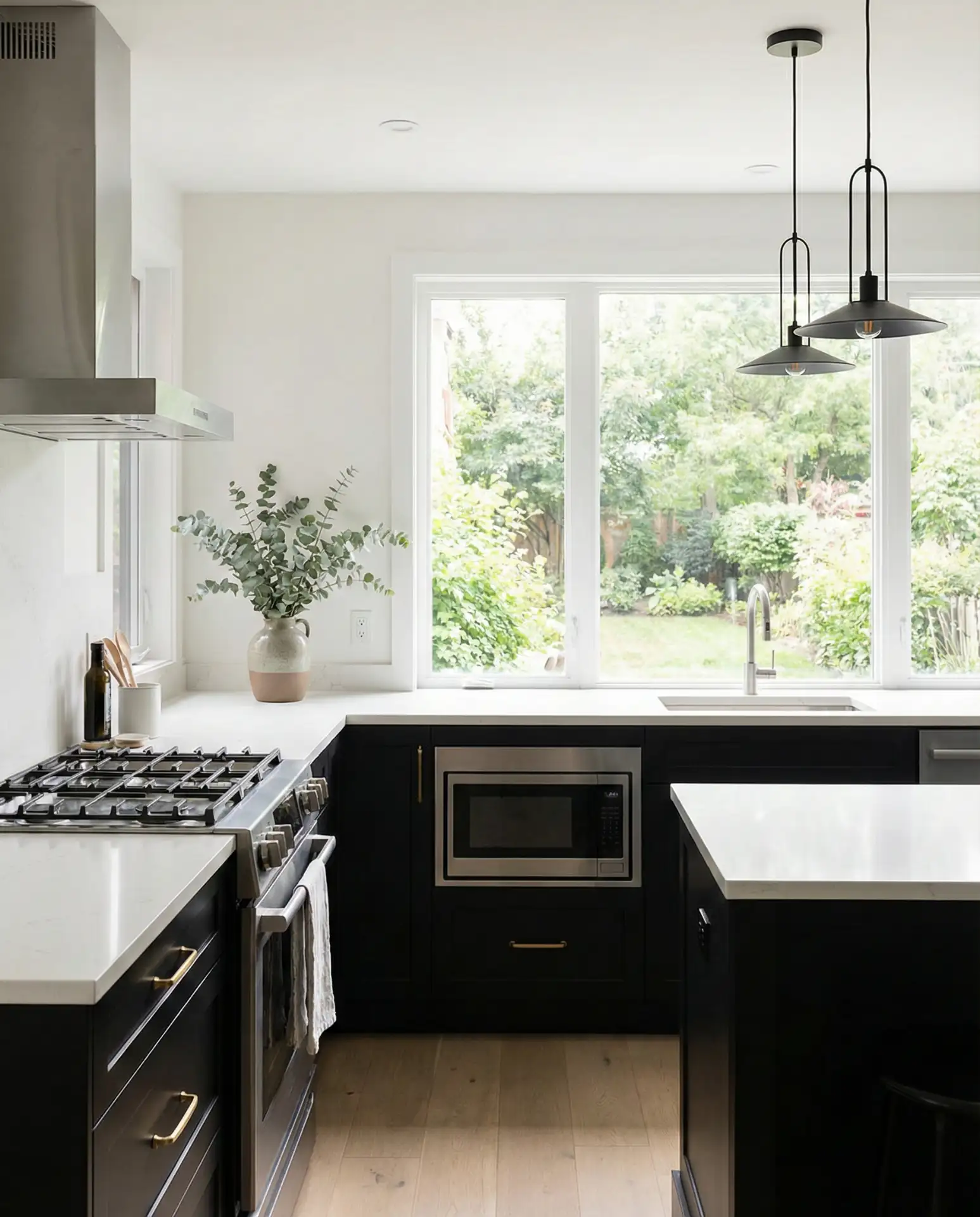 Matte Black Cabinets with White Quartz Countertops 1