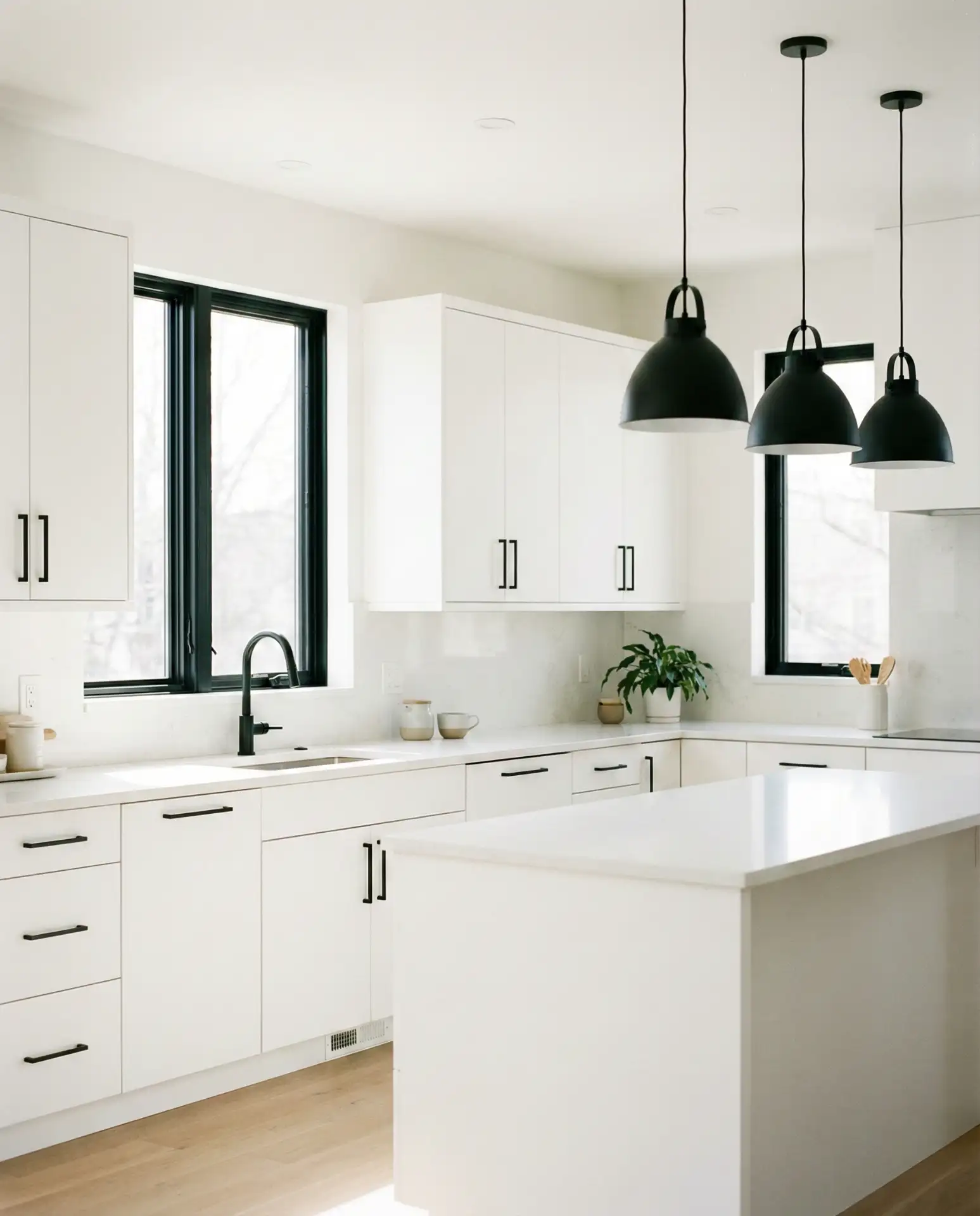 Minimalist White Kitchen with Black Accents 1