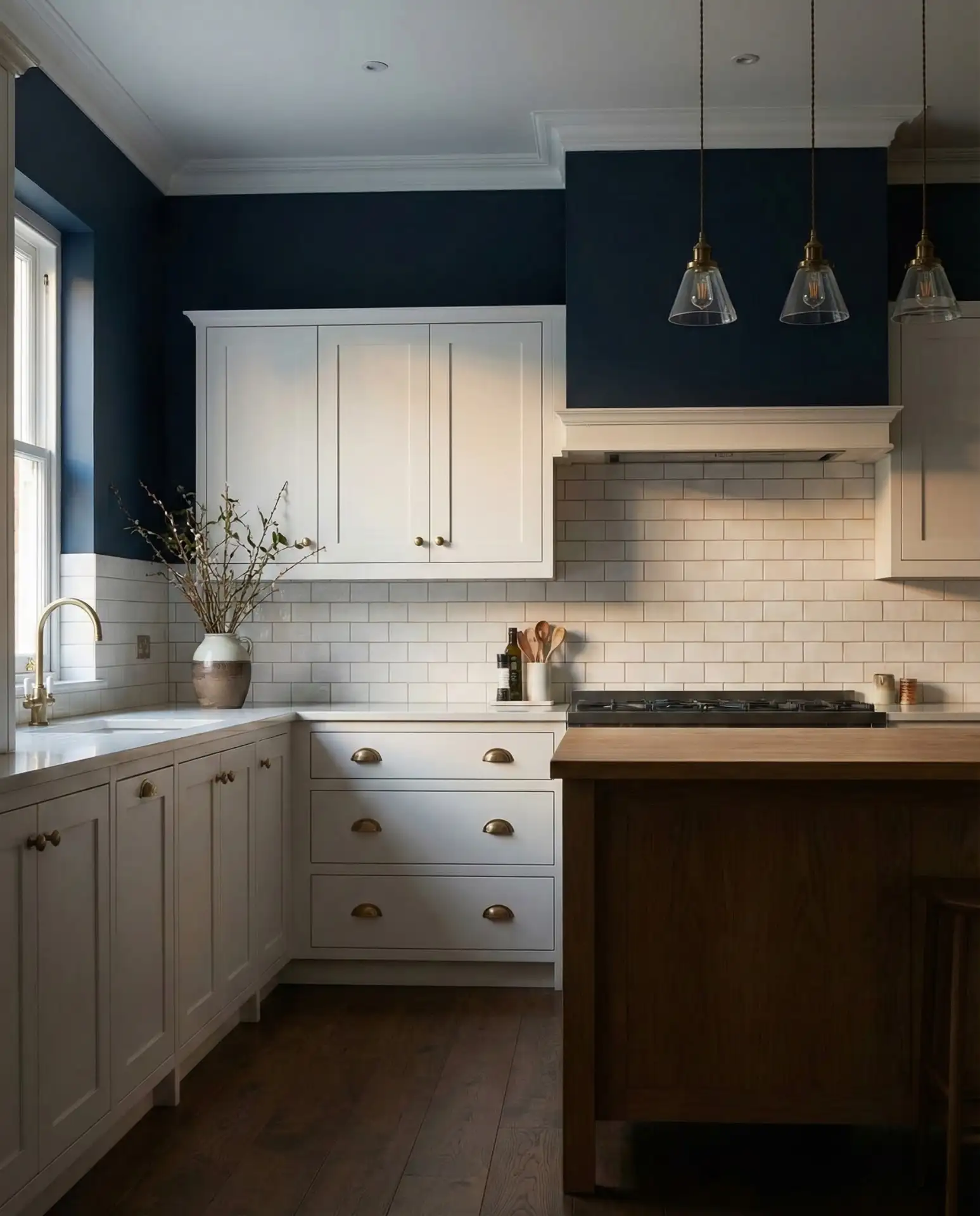 Navy Blue Walls with Brass and White Cabinets 1