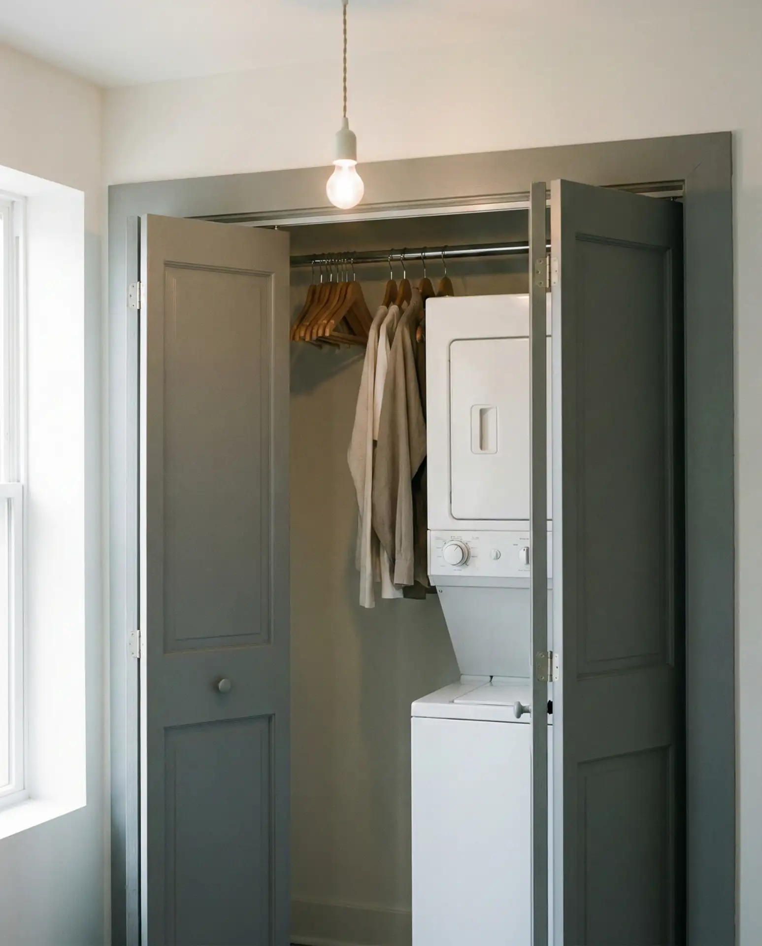 Stackable Closet Laundry with Bifold Doors 1