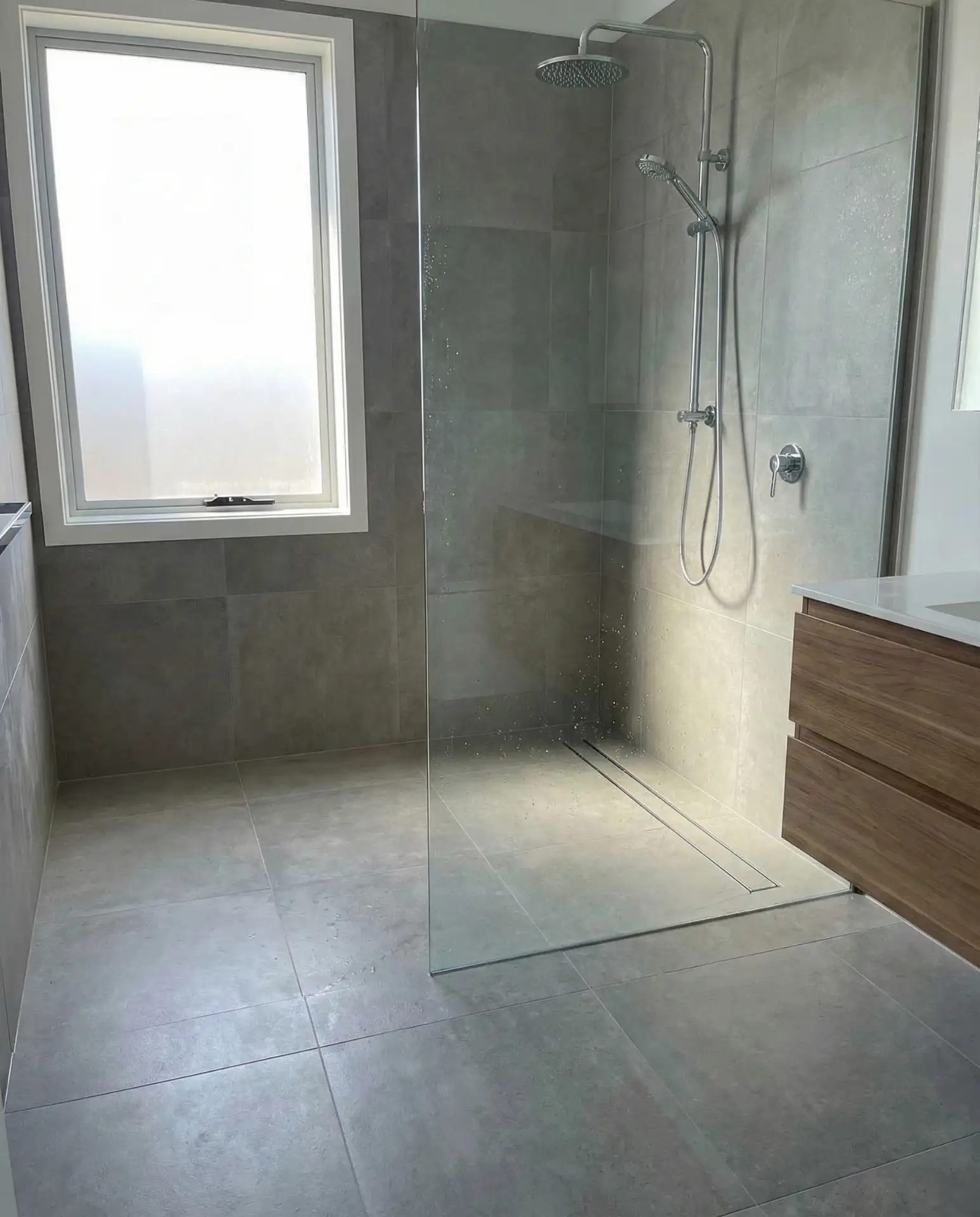 Walk-In Shower with Continuous Floor Tile 1