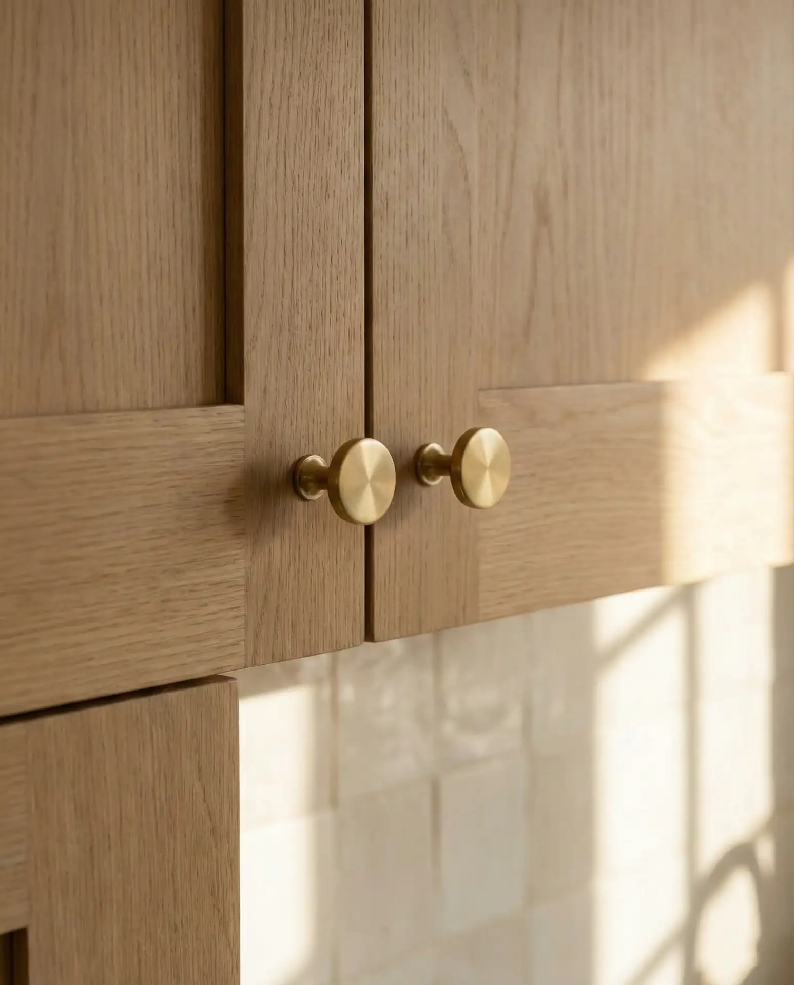 White Oak Cabinets with Gold Hardware Accents 1