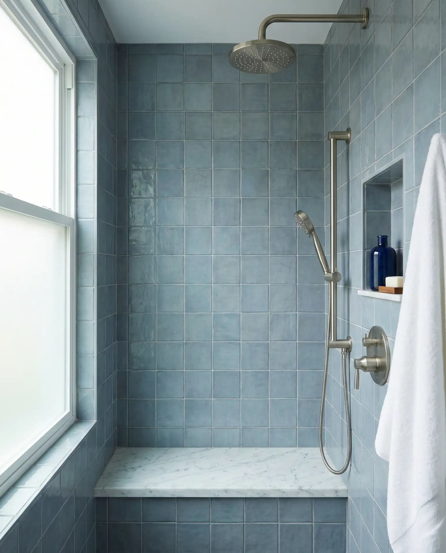 Bench-Lined Small Full Bathroom Shower in Blue 1