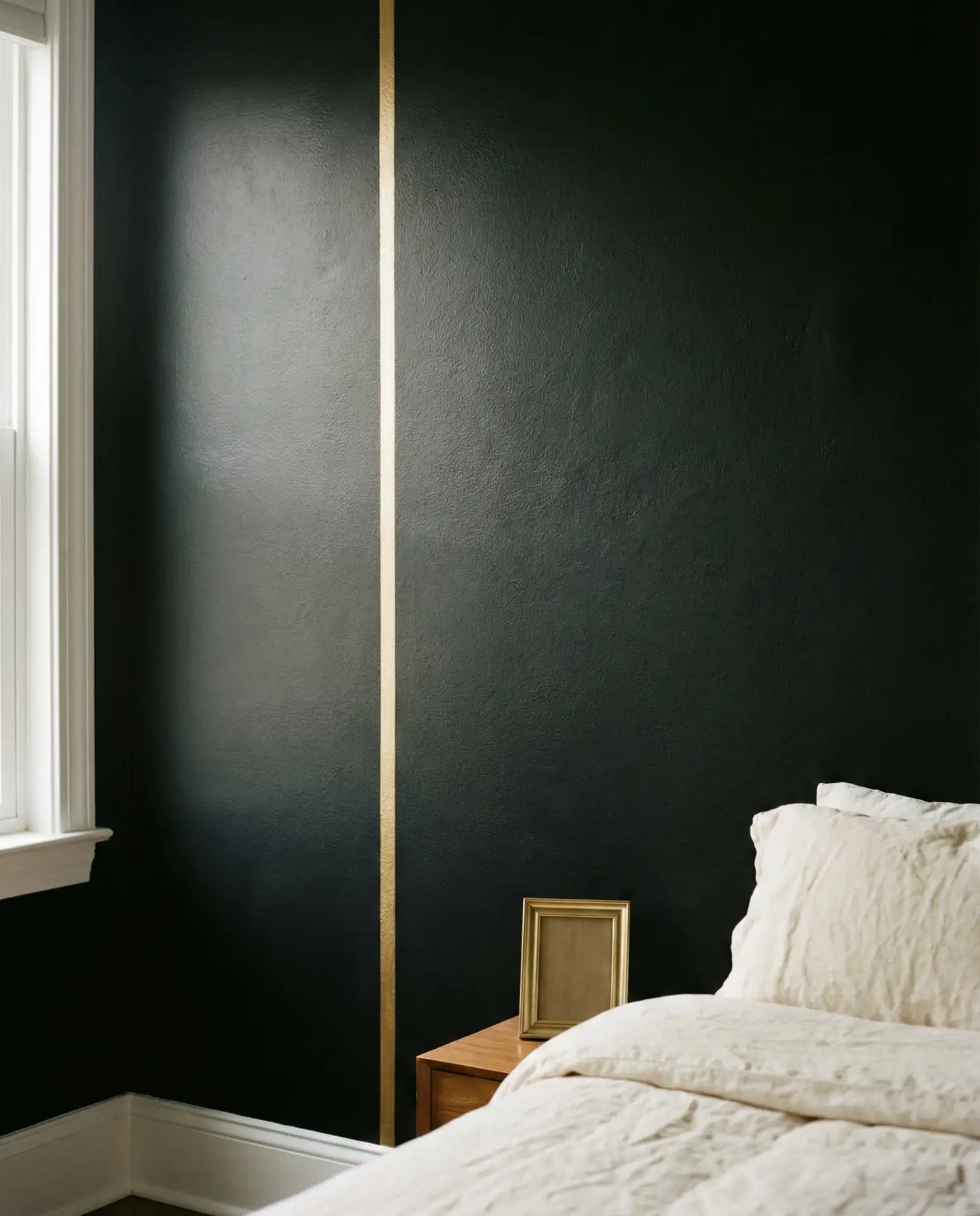Black Accent Wall with a Paint Color Accent Strip 1