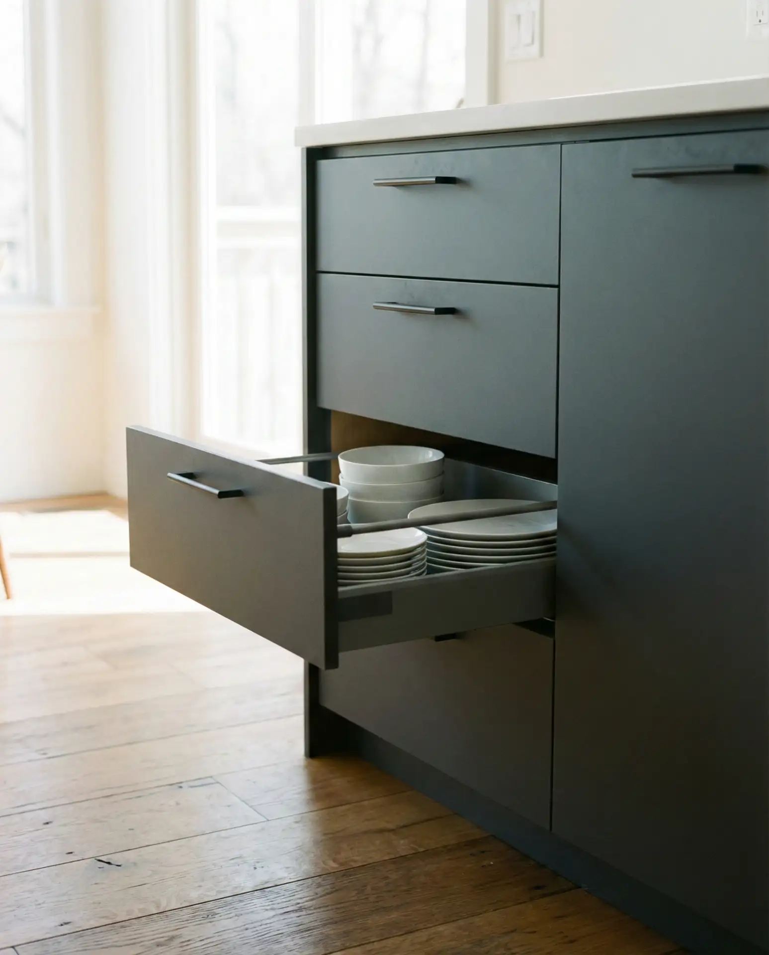 Gray Cabinets with Marble Backsplashes 1