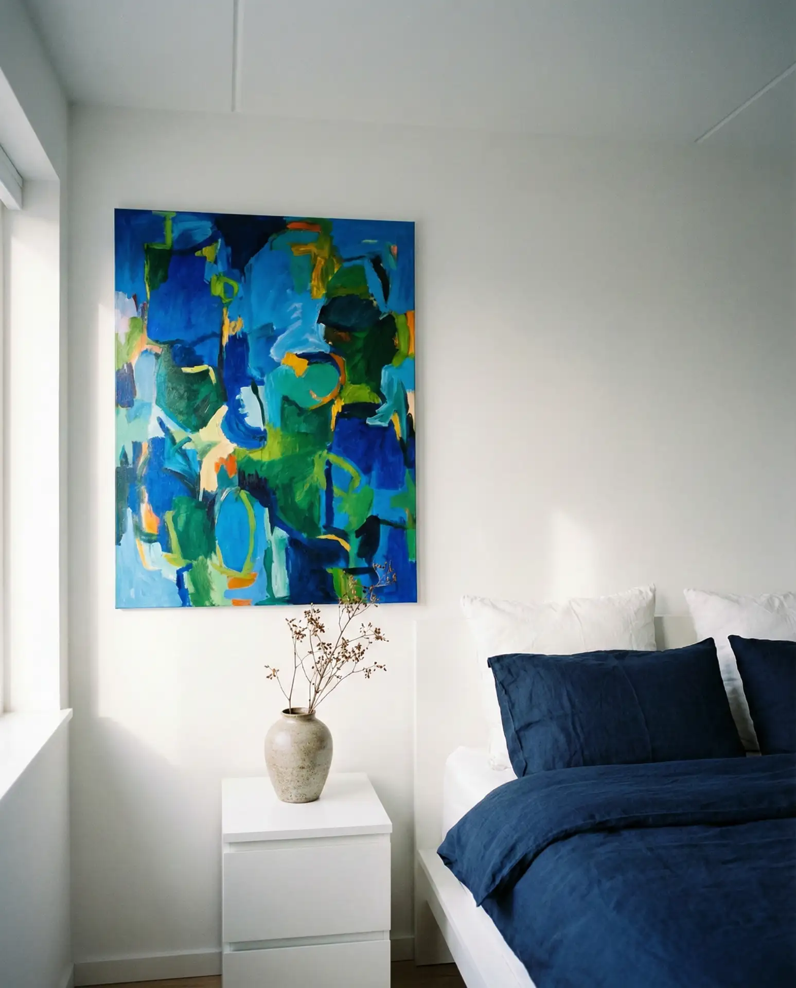 Navy and White Bedroom with Bold Color Art 2