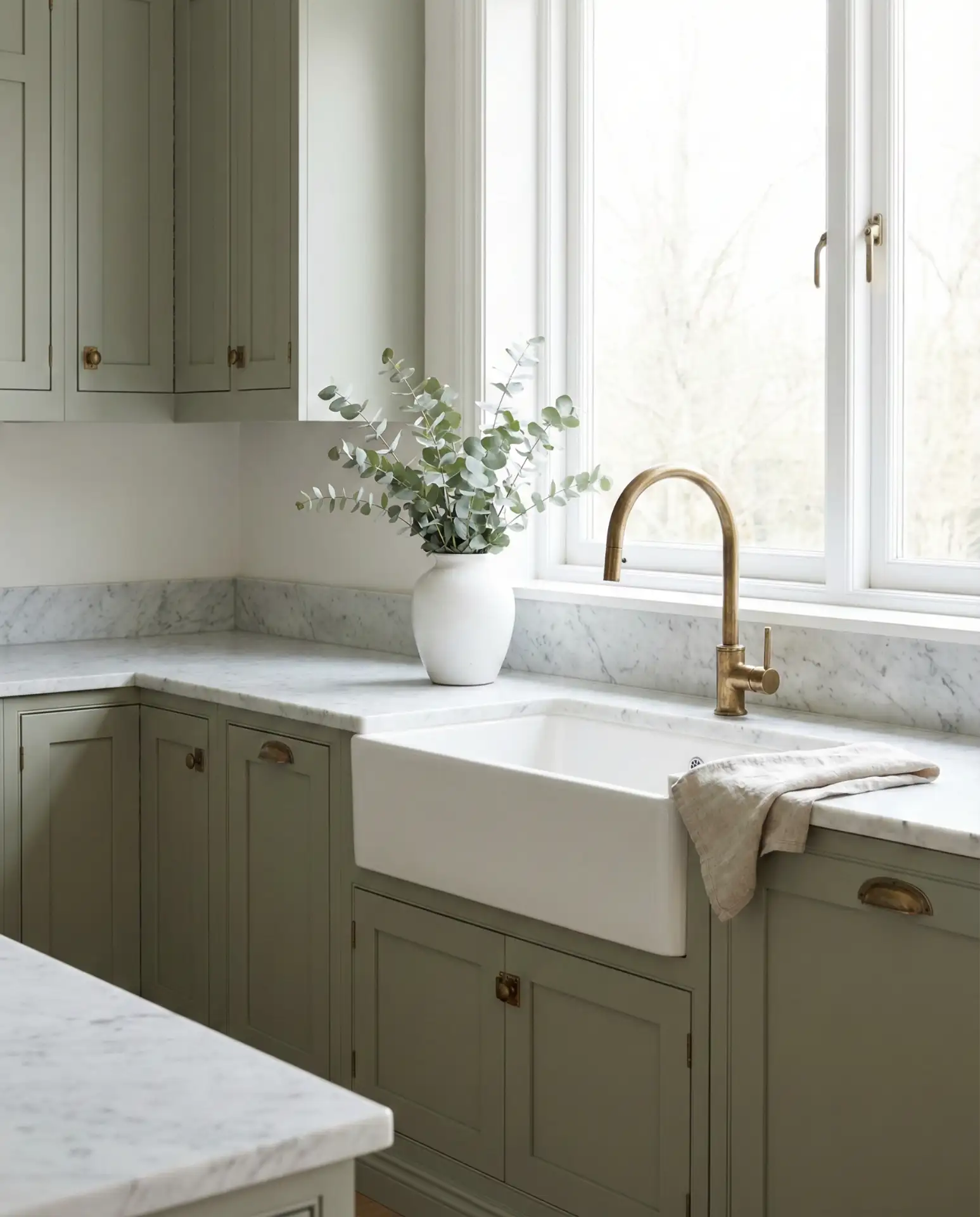 Sage Green Cupboards with White Marble Counters 2
