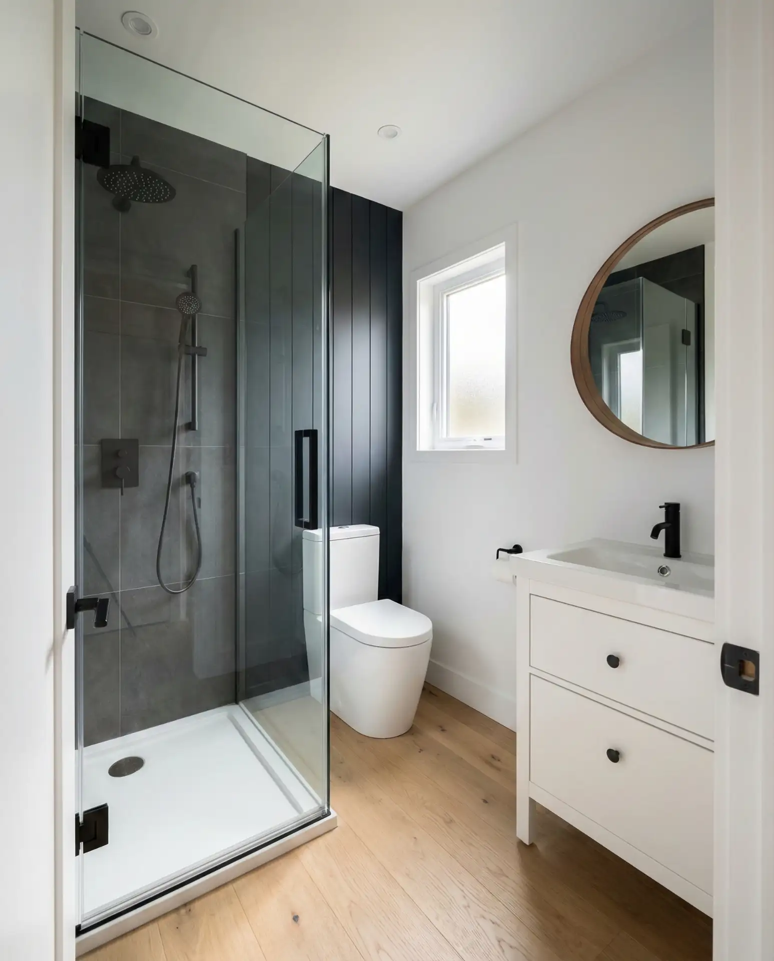 Small Bathroom Walk-In Shower with Dark Accents and Double Fixtures 2