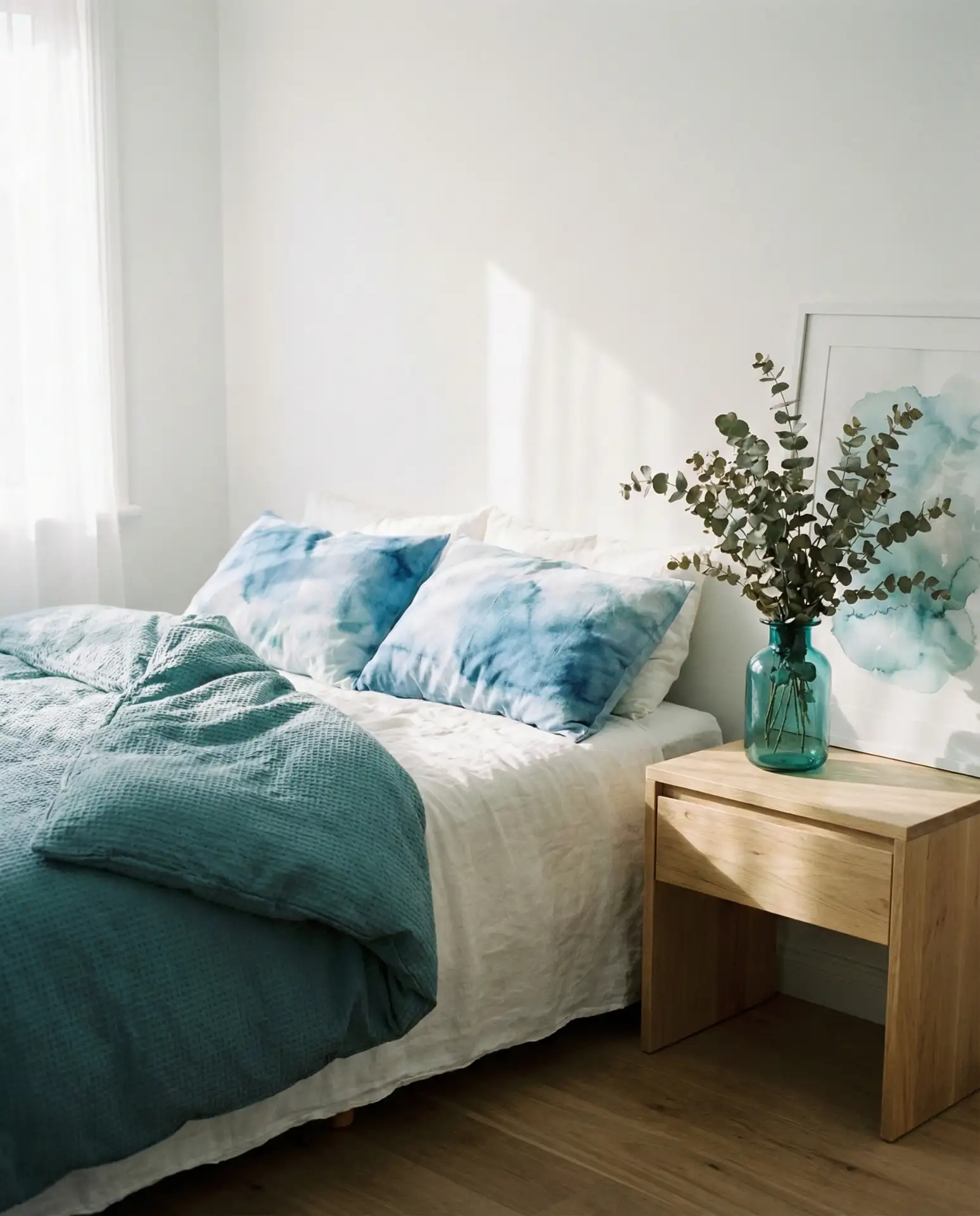 Teal and White Bedroom with Blue Watercolor Art 2