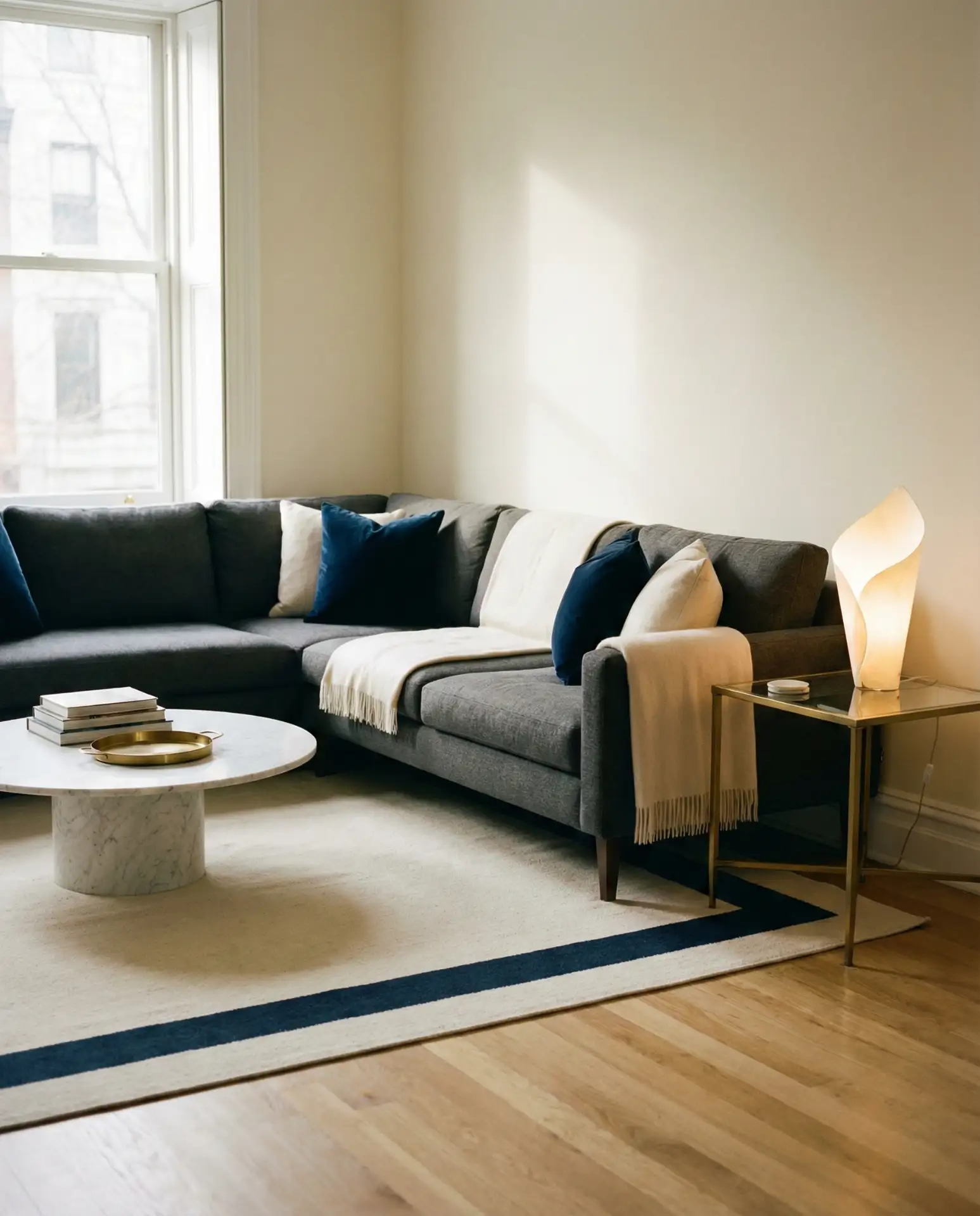 The Charcoal Sectional with Cream and Navy Layers 1