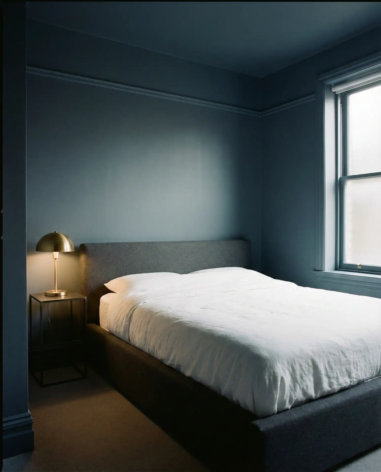 The Color-Drenched Walls with a Low-Profile King Bed 2