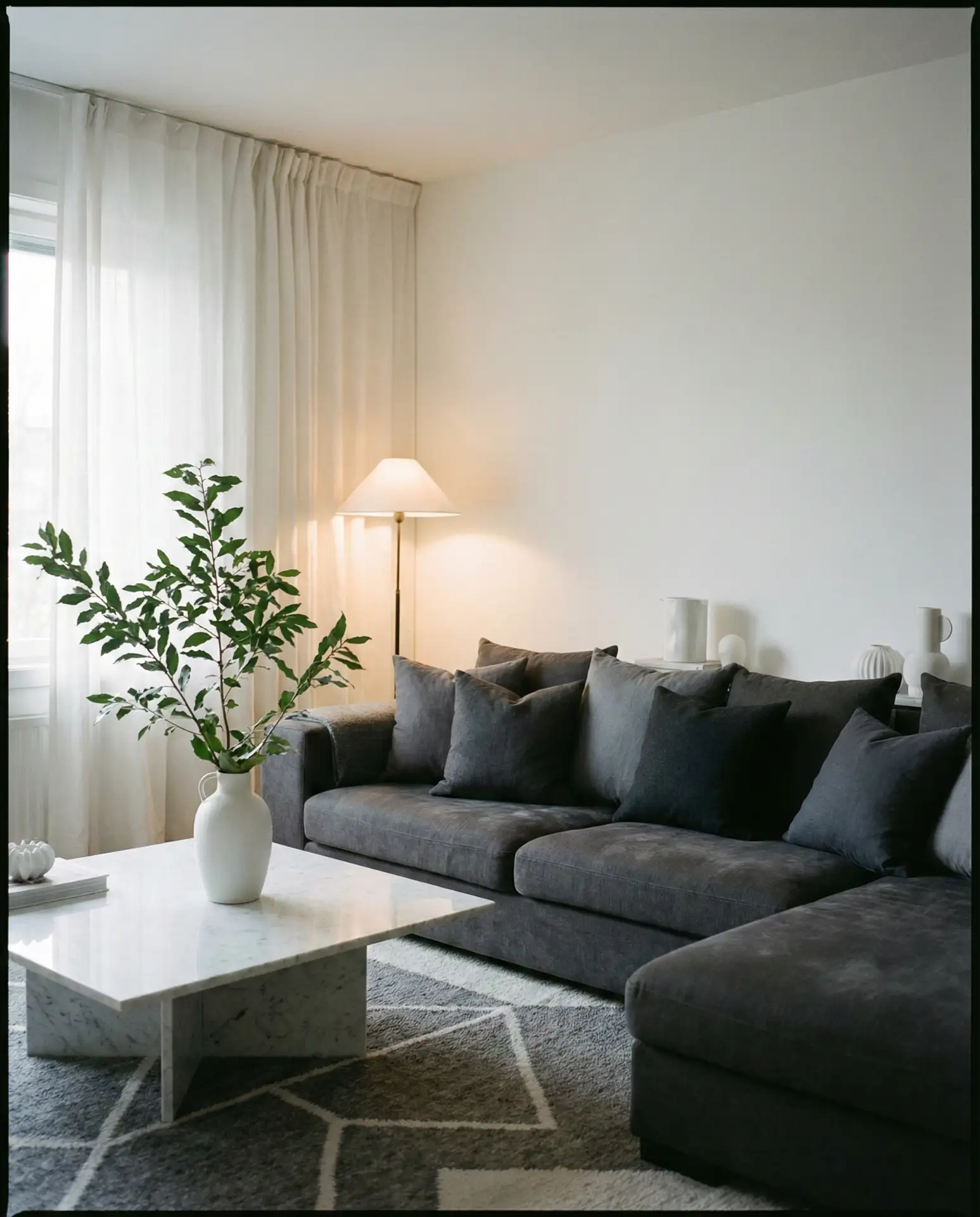 The Cozy Dark Grey Living Room with White Accents 1
