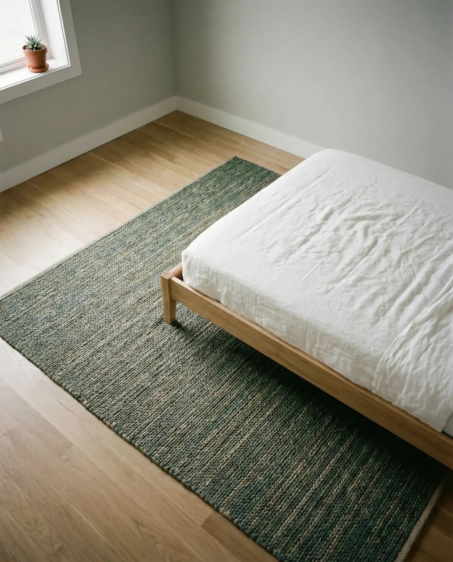 The Minimalist Bedroom with a Single Statement Rug 1