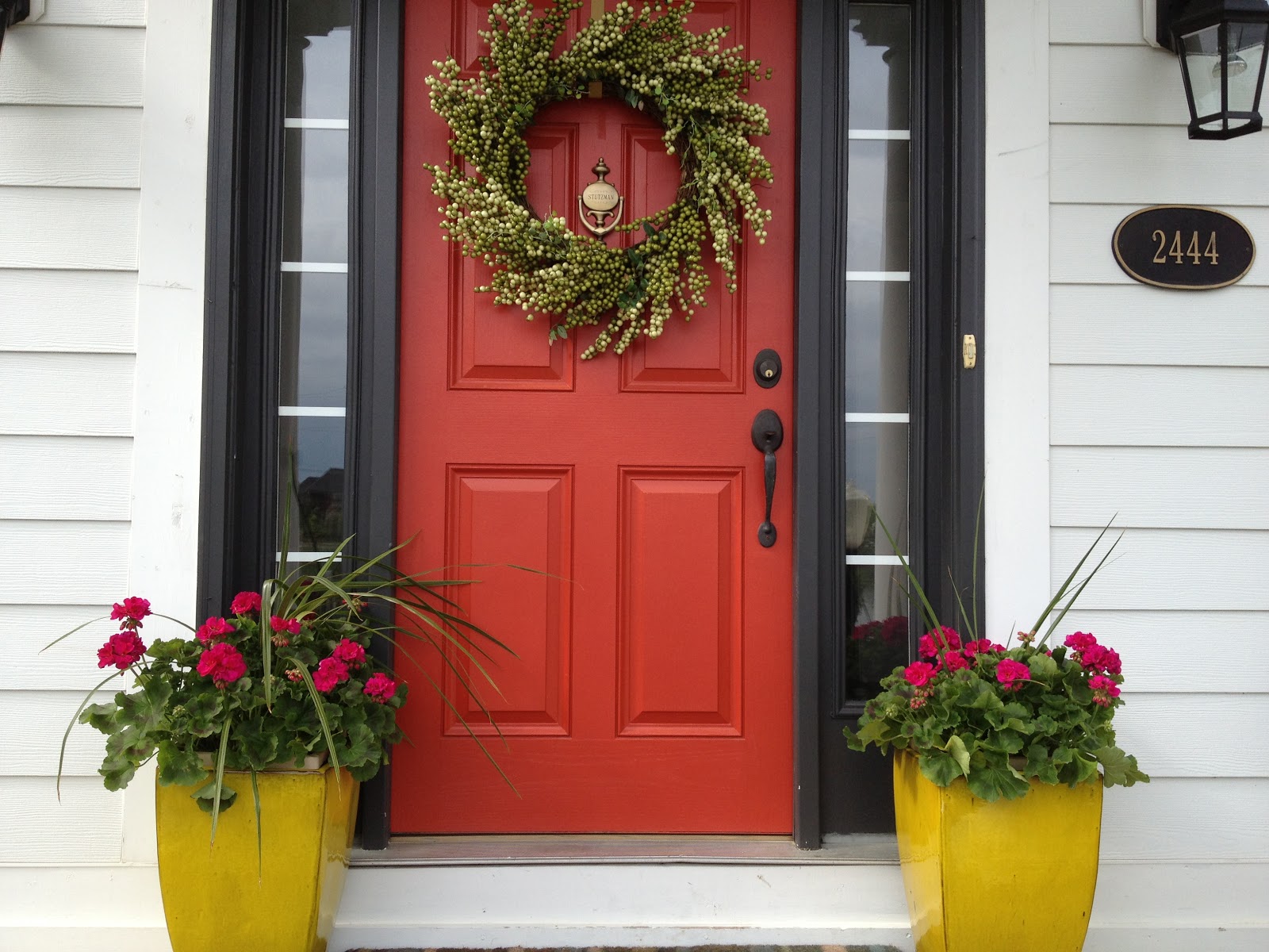 Creating a Charming Entryway with Red Front Doors | Decoist