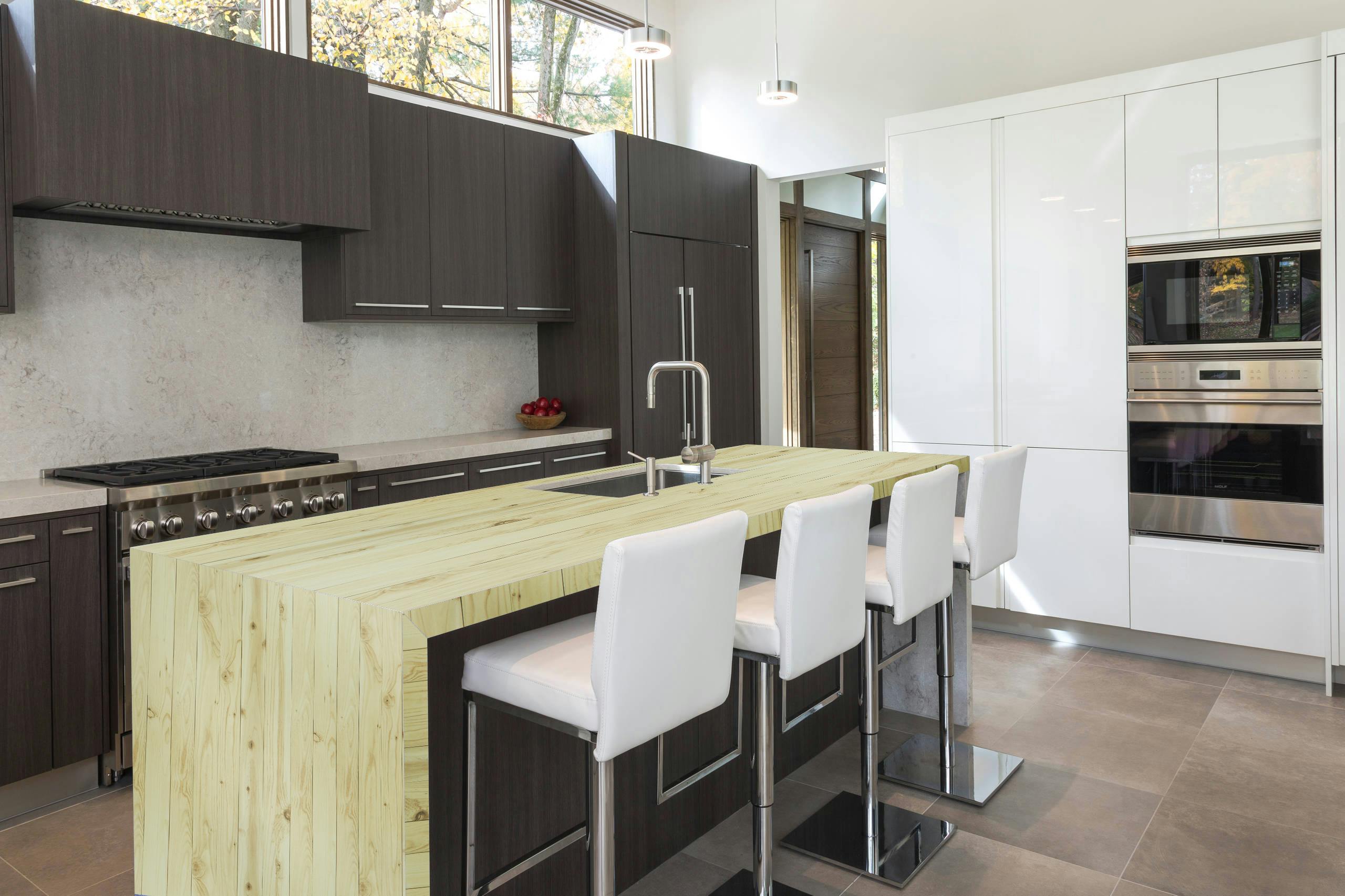 Sleek modern kitchen featuring a wooden island, stainless steel appliances, and elegant decor.