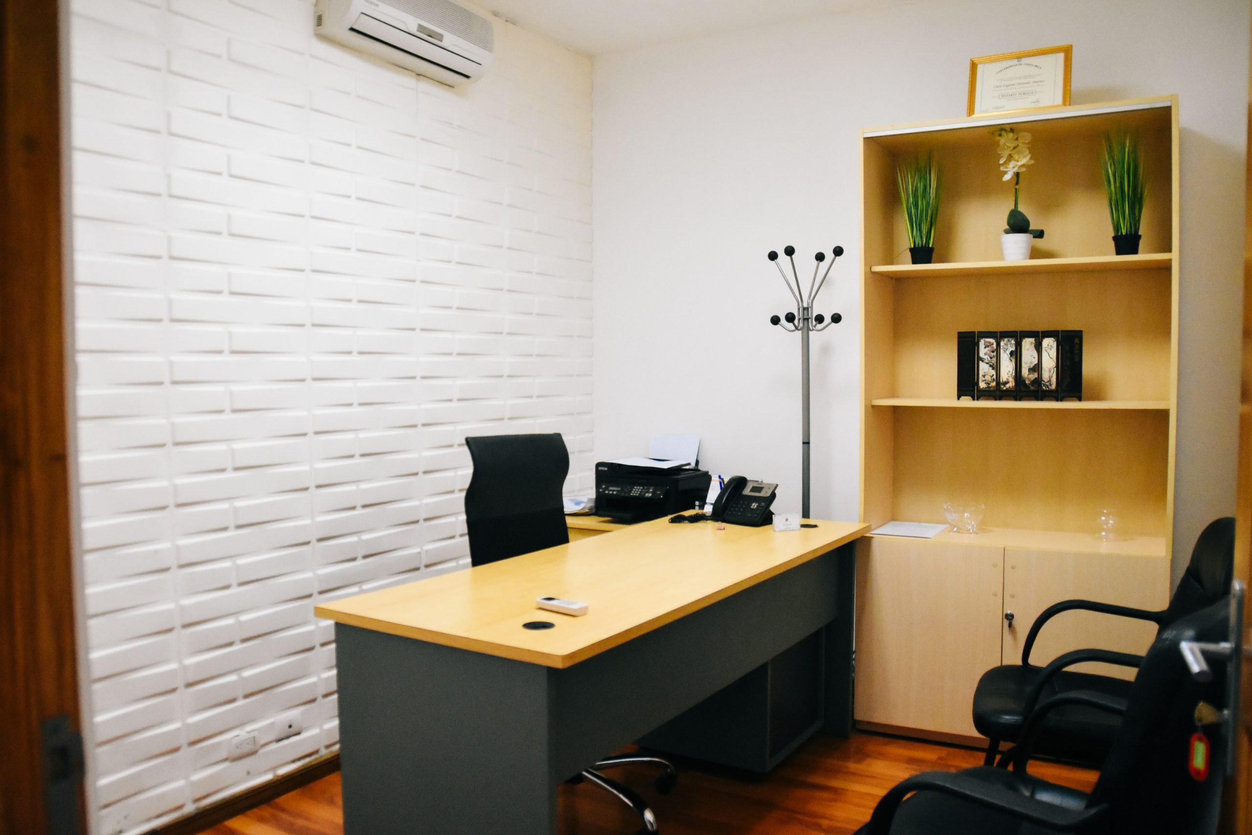 small office in coworking center for startups with clean new furniture