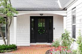 The Power of a Black Front Door: Enhancing Curb Appeal and Home Value | Nestfully