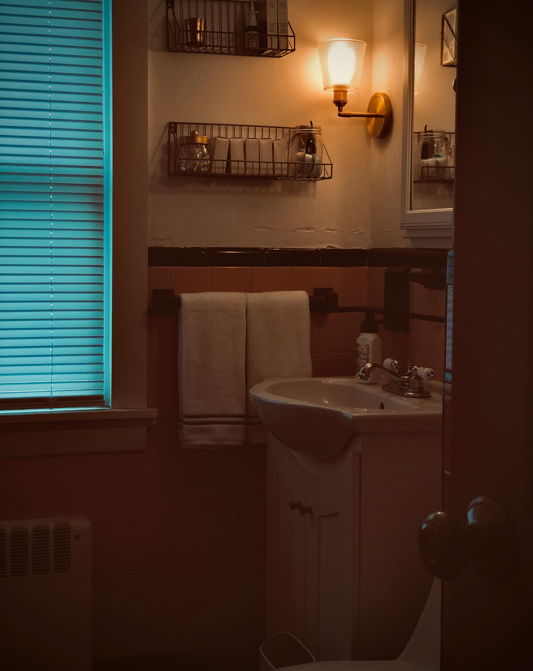 We live in a house that is nearly 100 years old. Our house has a lot of built-in character, which we love. Still, sometimes we find that built-in character to be a bit dated (like our pink and black t