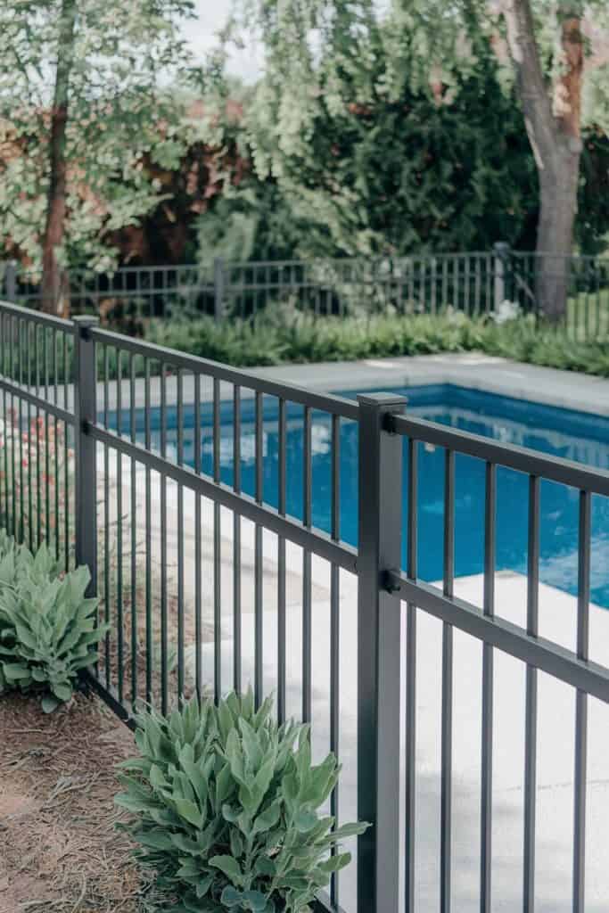 35 Pool Fence Ideas for a Safe, Stunning, and Functional Barrier