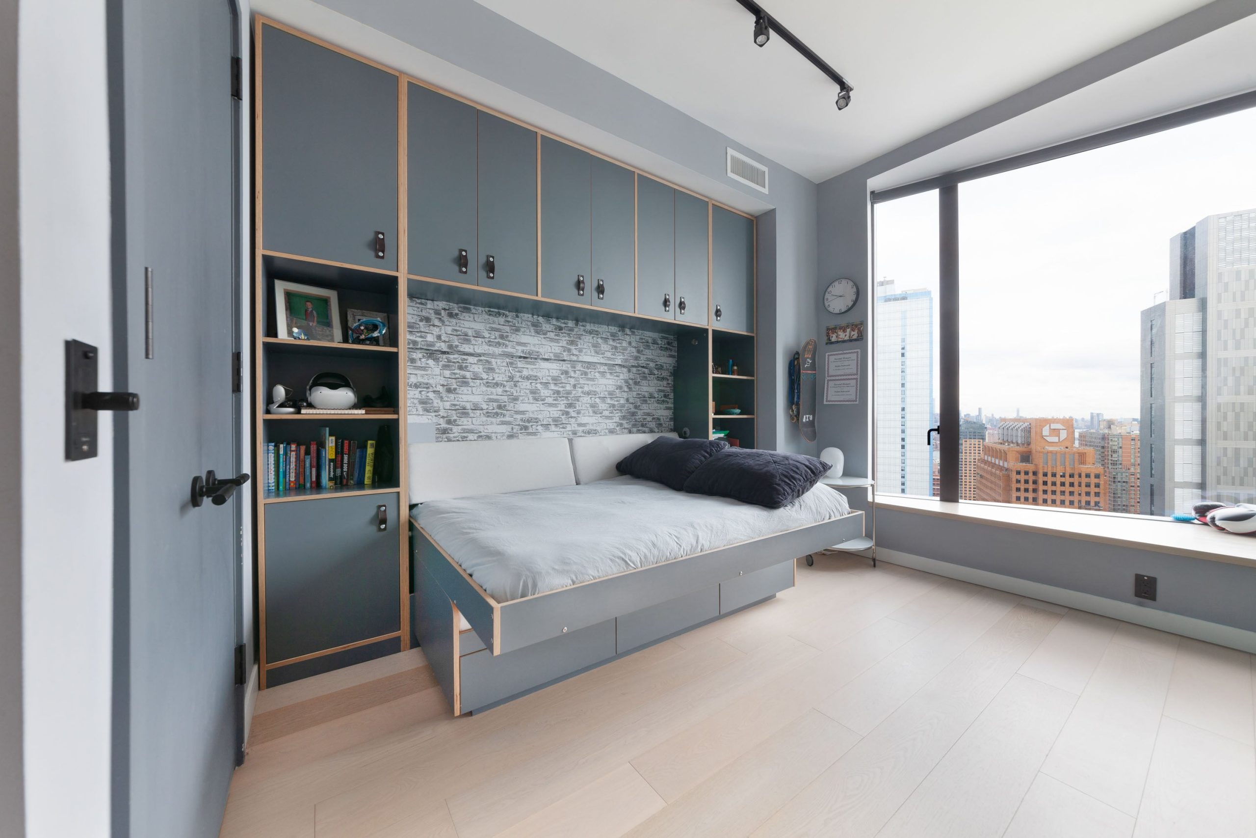 Stefan's Room: Wall-to-Wall Storage With A Tucked Away Bed