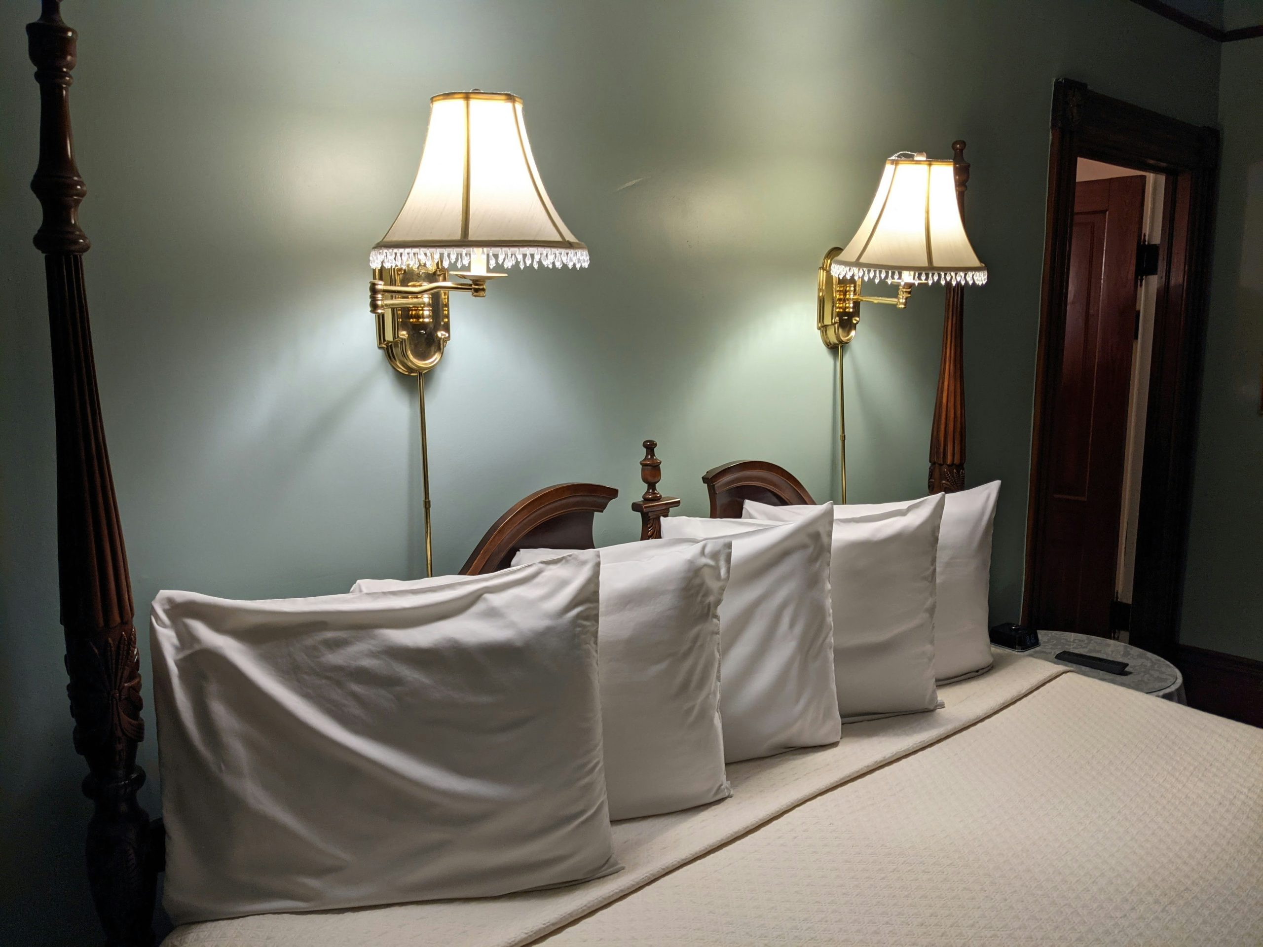 4 pillows on a king; located at The Fairbanks House in Amelia Island.
