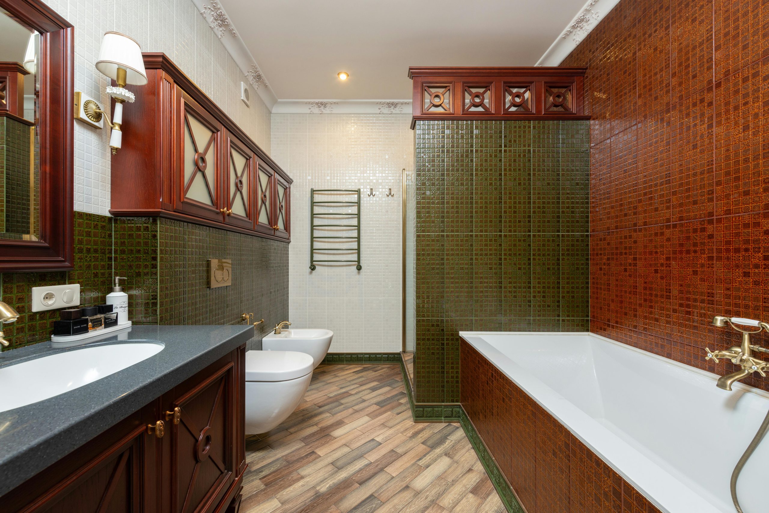 A beautifully designed traditional bathroom featuring luxurious fixtures and classic tiles.