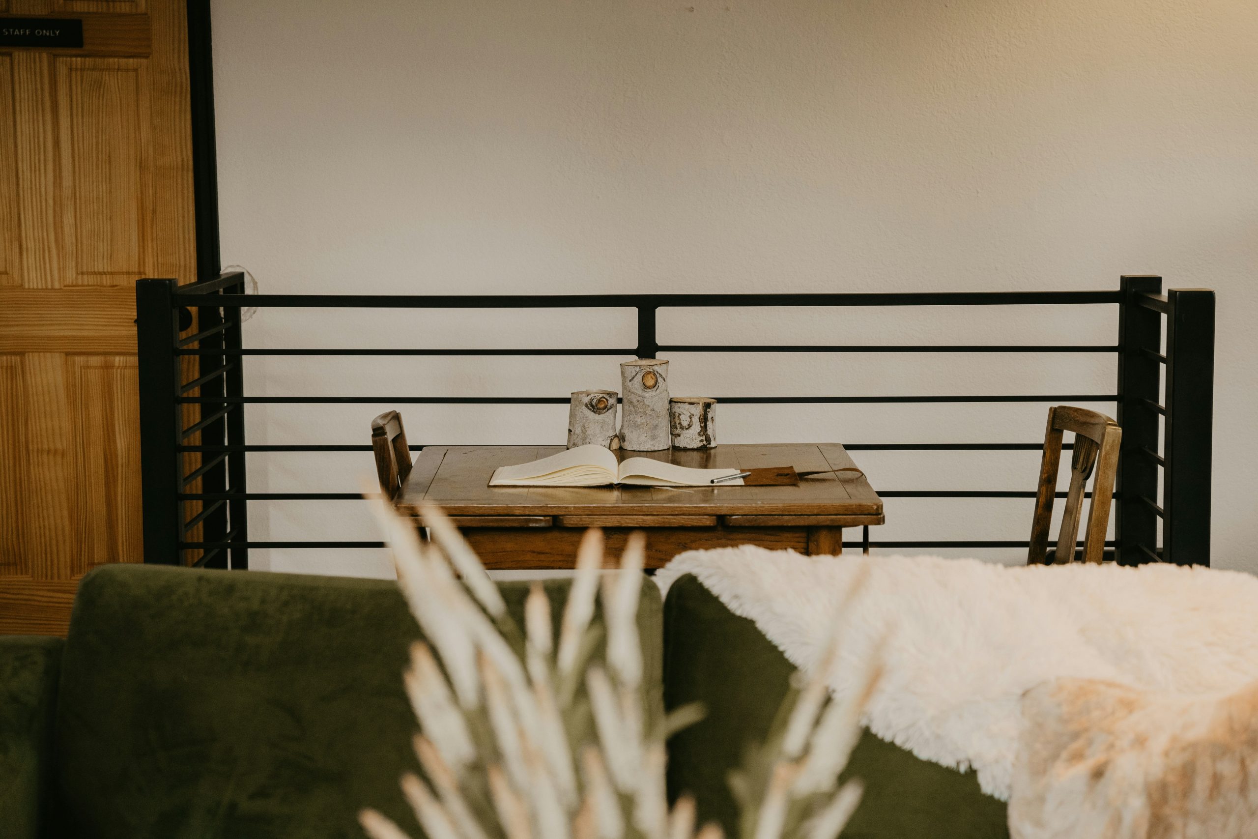 a living room with a couch and a table
