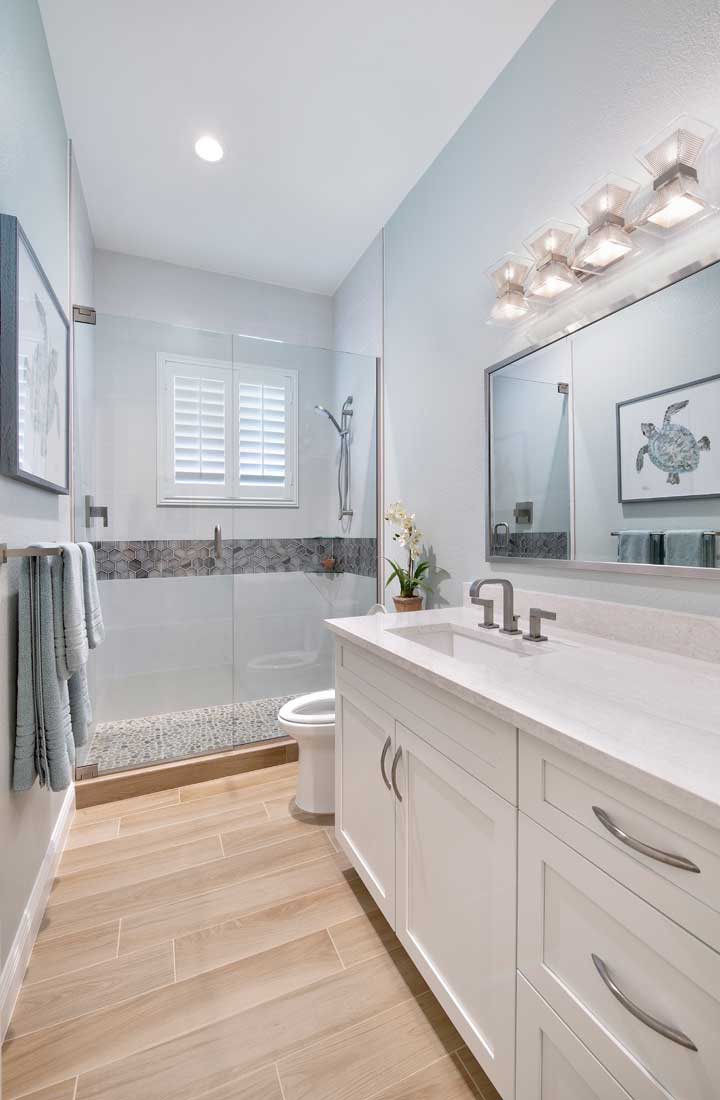 A Modern Primary Bathroom, Guest Bath, and Pool Bathroom Remodel in Bonita Springs, FL