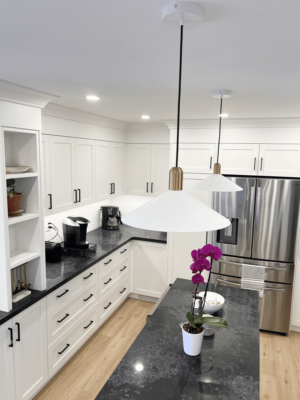 Beautiful White Kitchen With Black Quartz Countertop | EasyRenovation