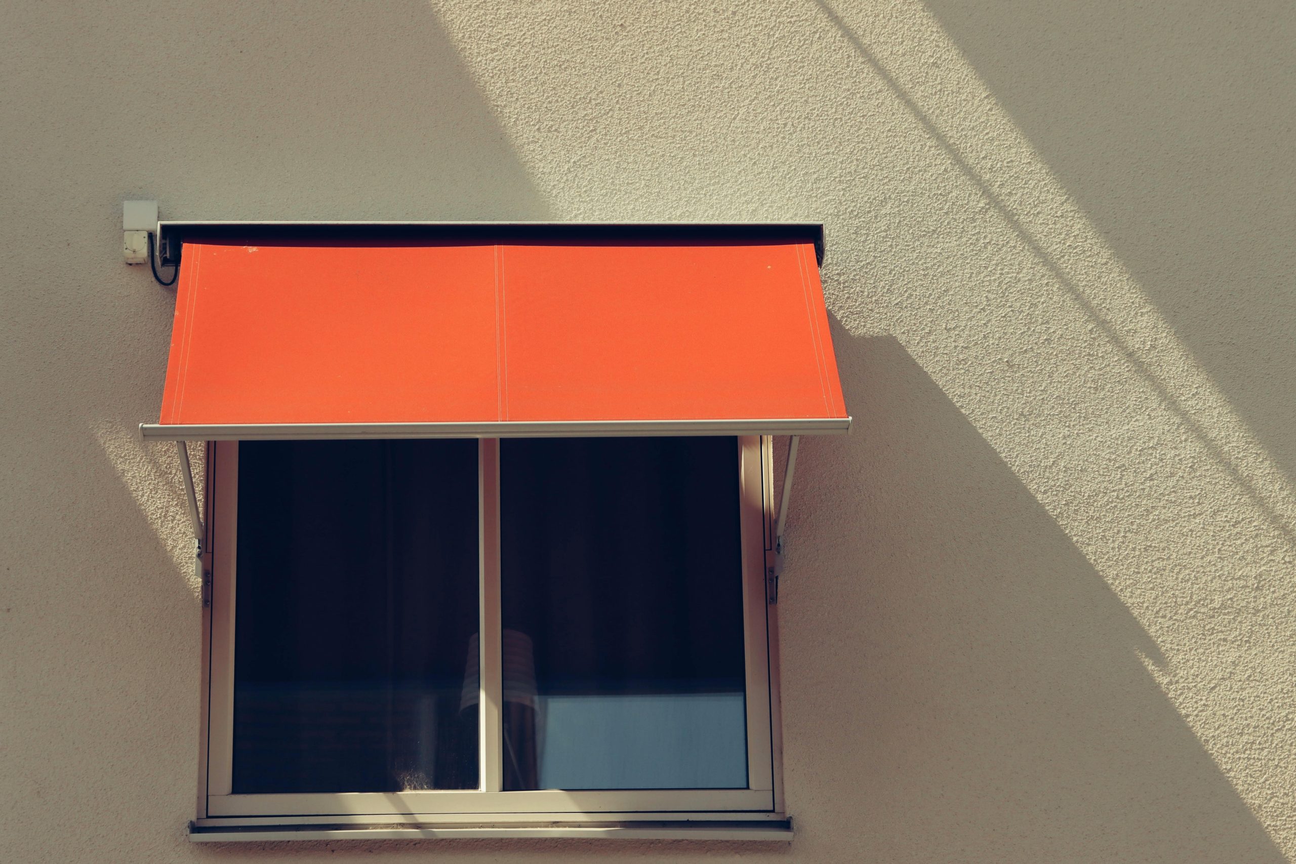 Close-up of a red awning over a window in Jönköping, Sweden.
