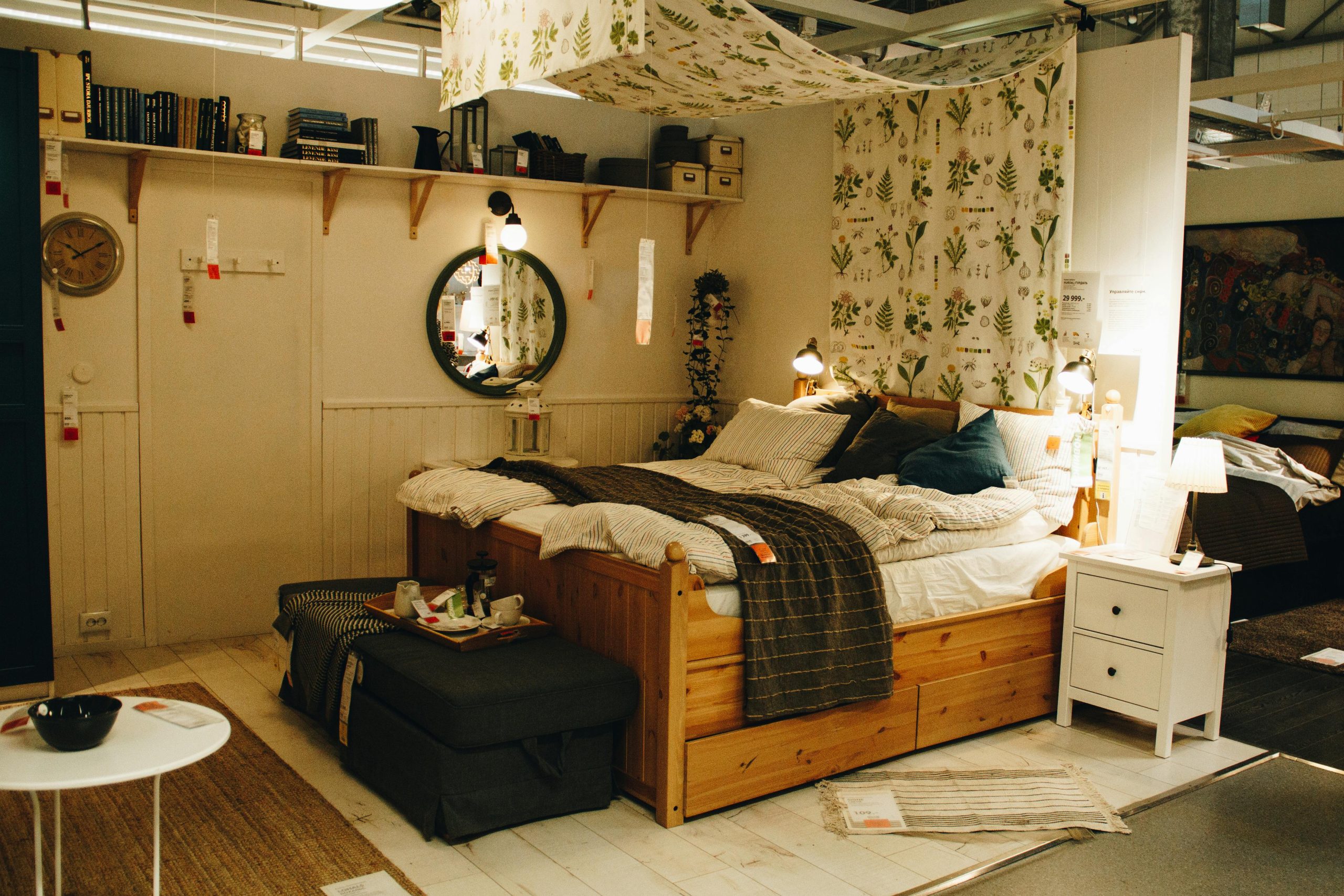 Explore a cozy and modern bedroom setup featuring wooden furniture, decorative rugs, and stylish lighting.