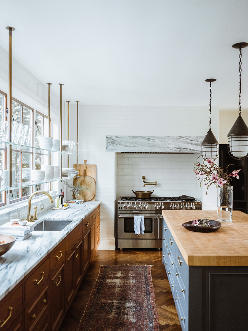 Here's a Bright Storage Idea: Extend Your Open Shelving Across the Kitchen Windows