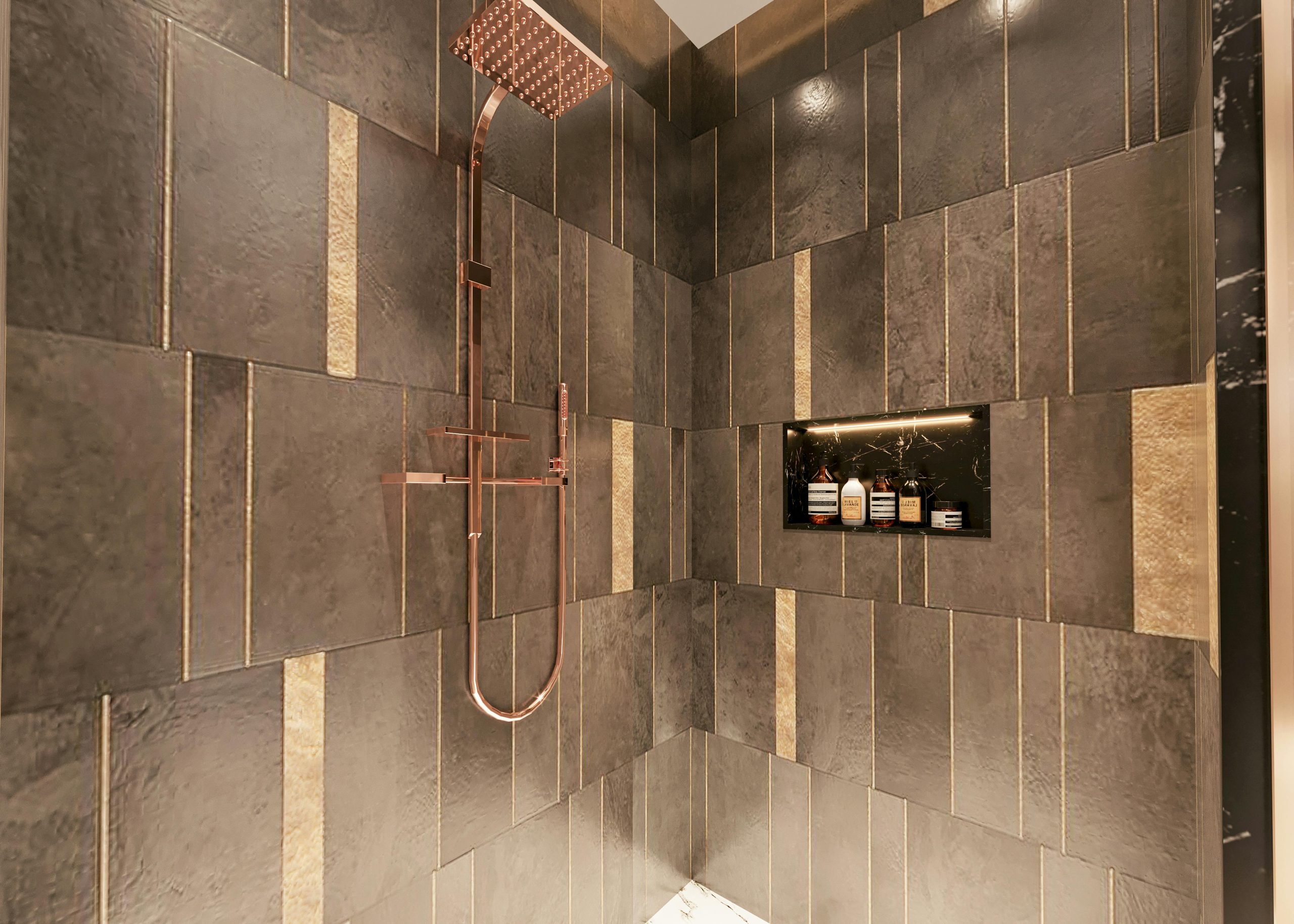 Luxurious modern shower with dark textured tiles and copper fixtures for a sophisticated bathroom design.
