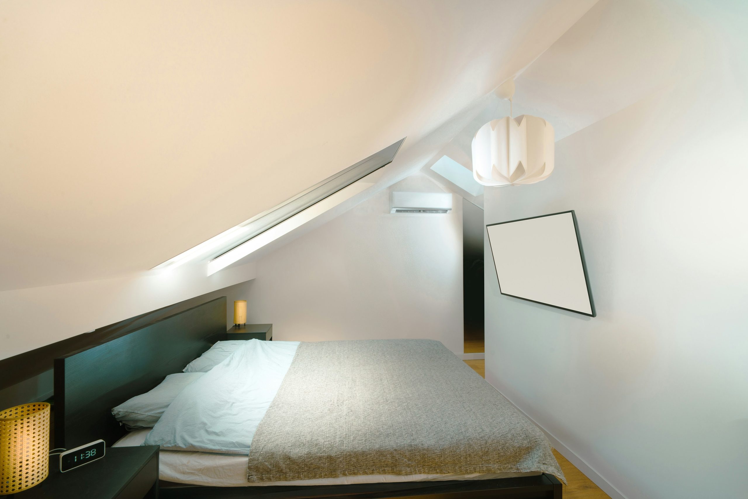 Room attic. Smart clock home bedroom with lcd display wall.