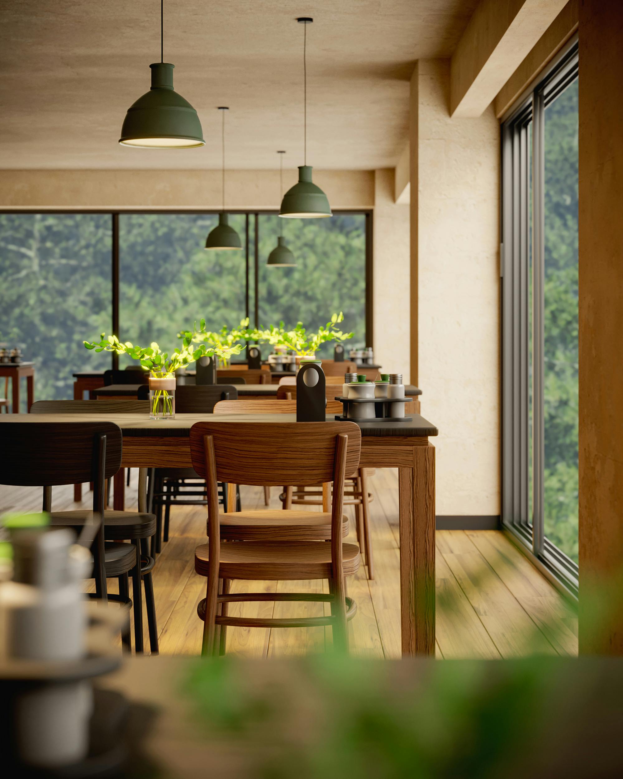 Spacious dining area with wooden tables, chairs, and large glass windows showcasing greenery.