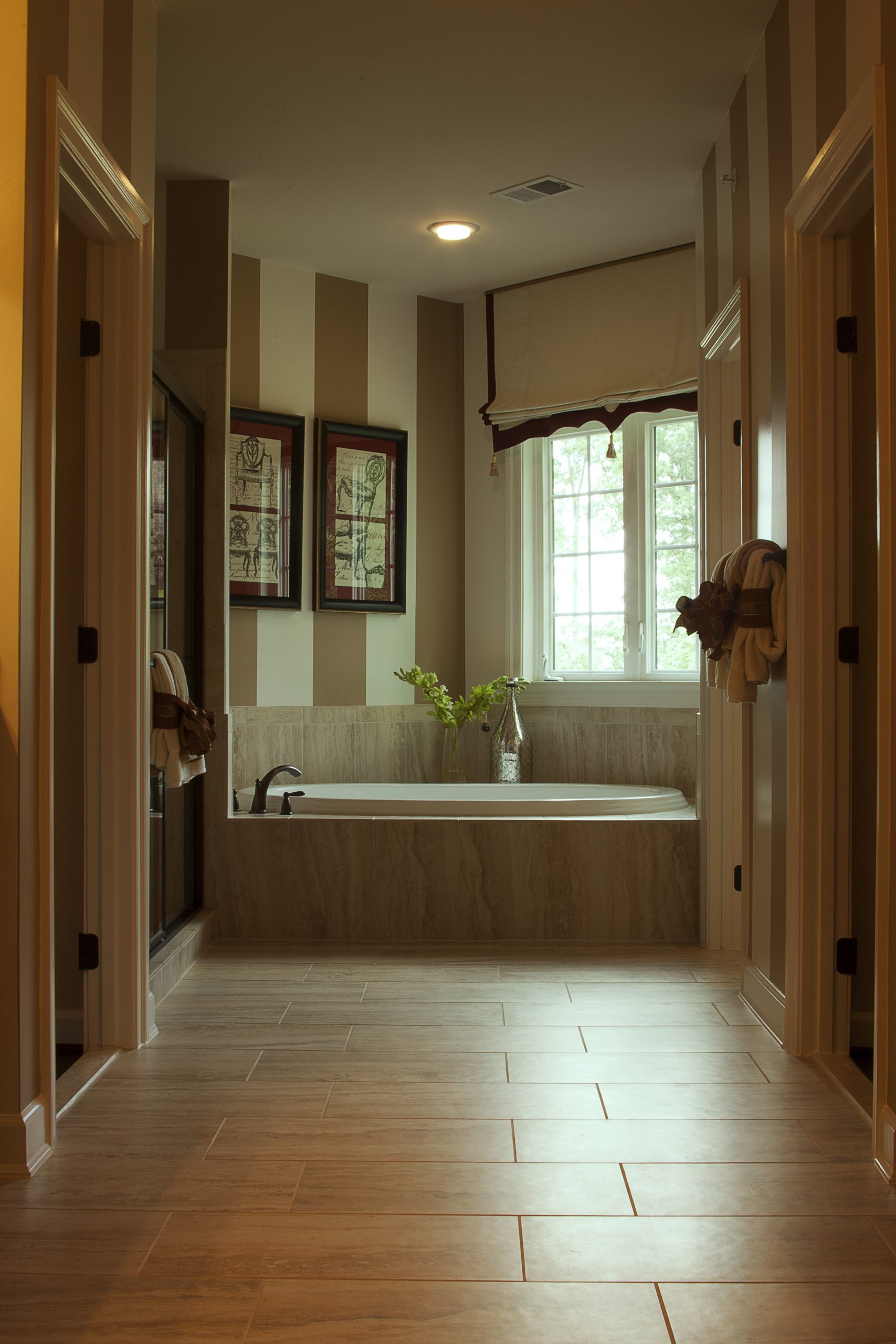 Stylish bathroom featuring a modern bathtub and chic interior design.