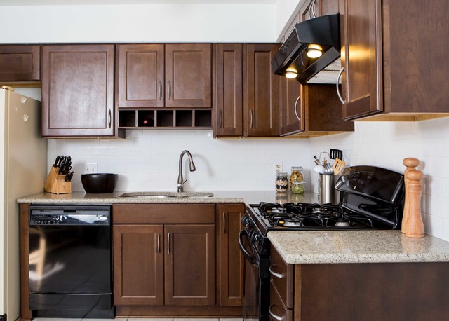 Traditional Dark Wood Kitchen with Black Appliances - Traditional - Kitchen - Austin - by UB Kitchens - Kitchen Design and Cabinets | Houzz