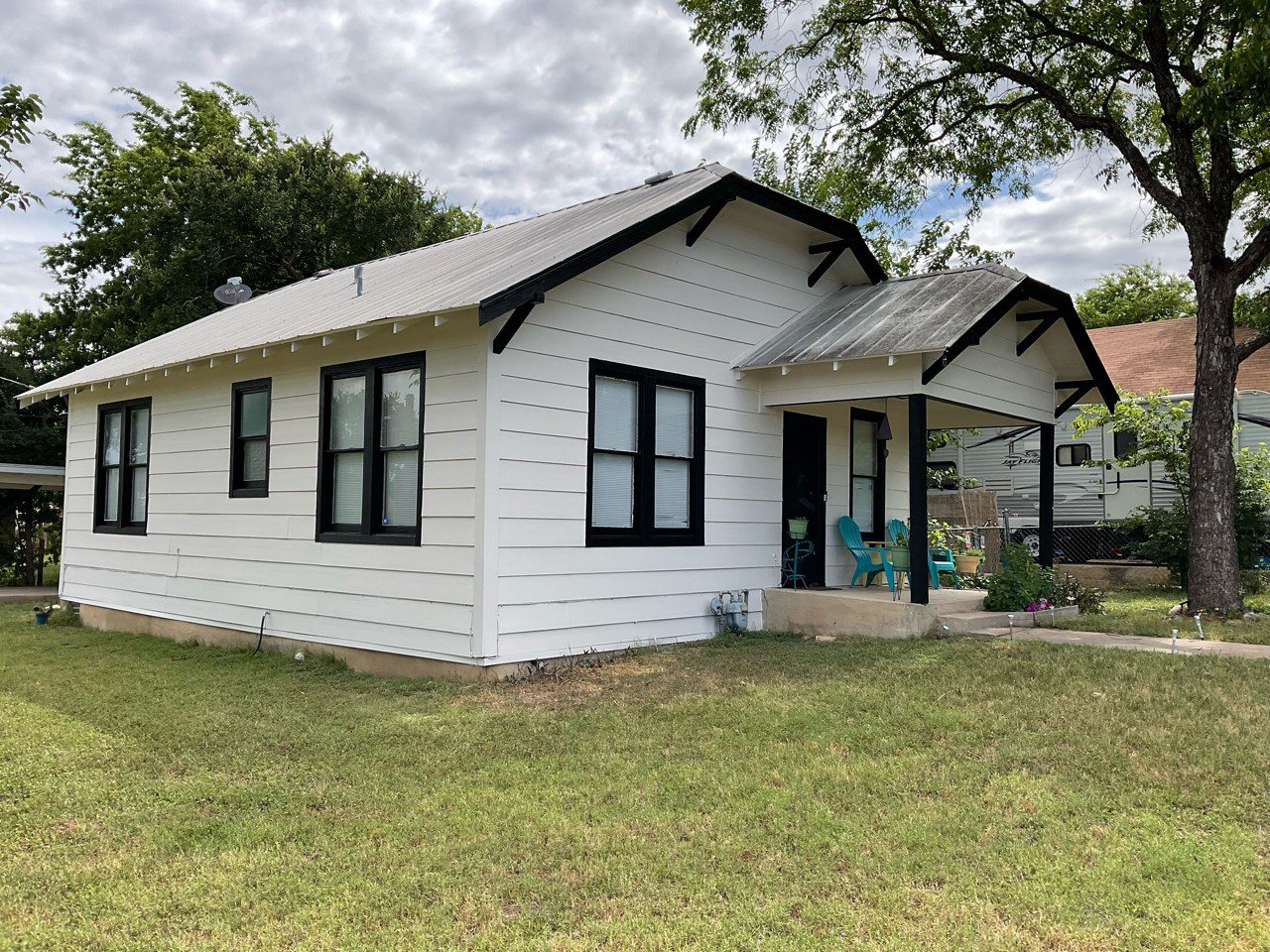 Wood White House with Black Trim – SurePRO Painting