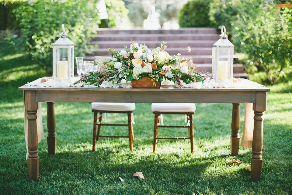 30 Rustic Wedding Centerpieces That Go Beyond the Basic Mason Jar