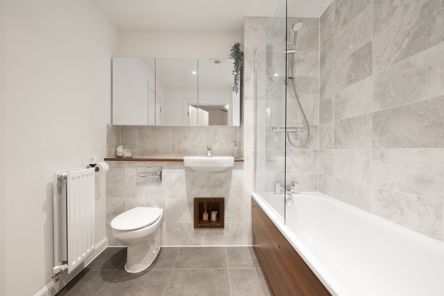 6 Simple Design Changes Designers Use to Brighten Windowless Bathrooms and Make Them Feel More Spacious