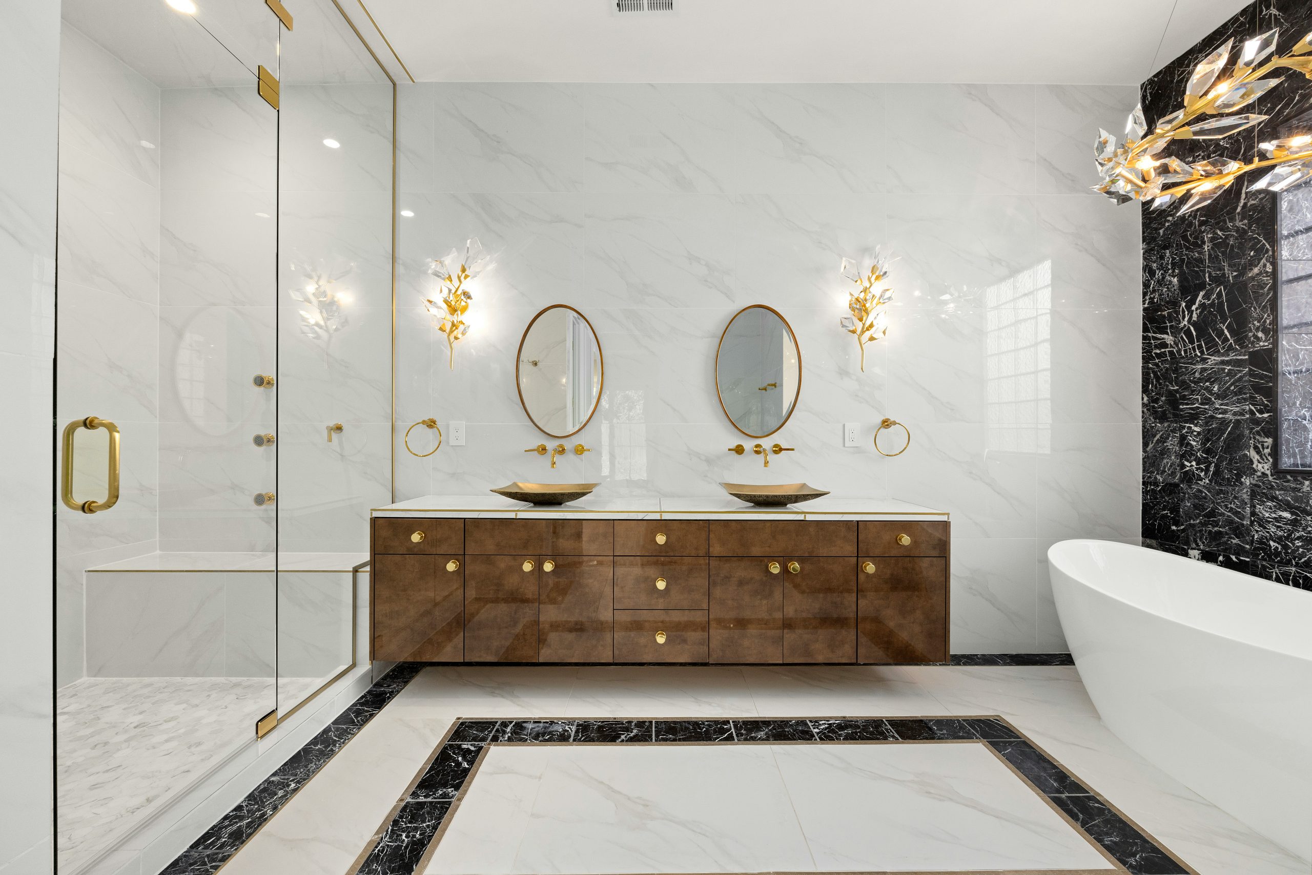 a bathroom with two sinks and a bathtub
