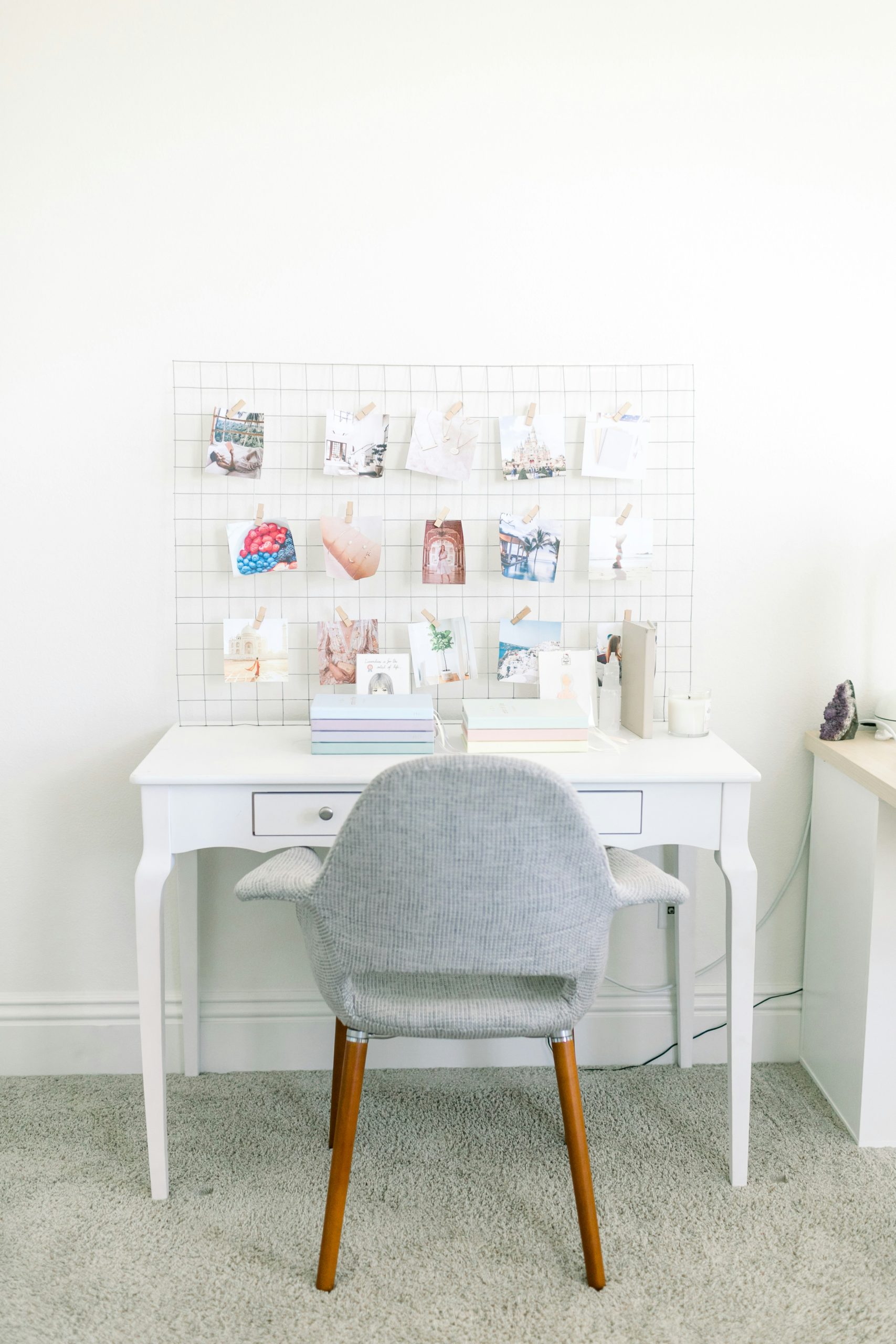 a chair sitting in front of a white desk