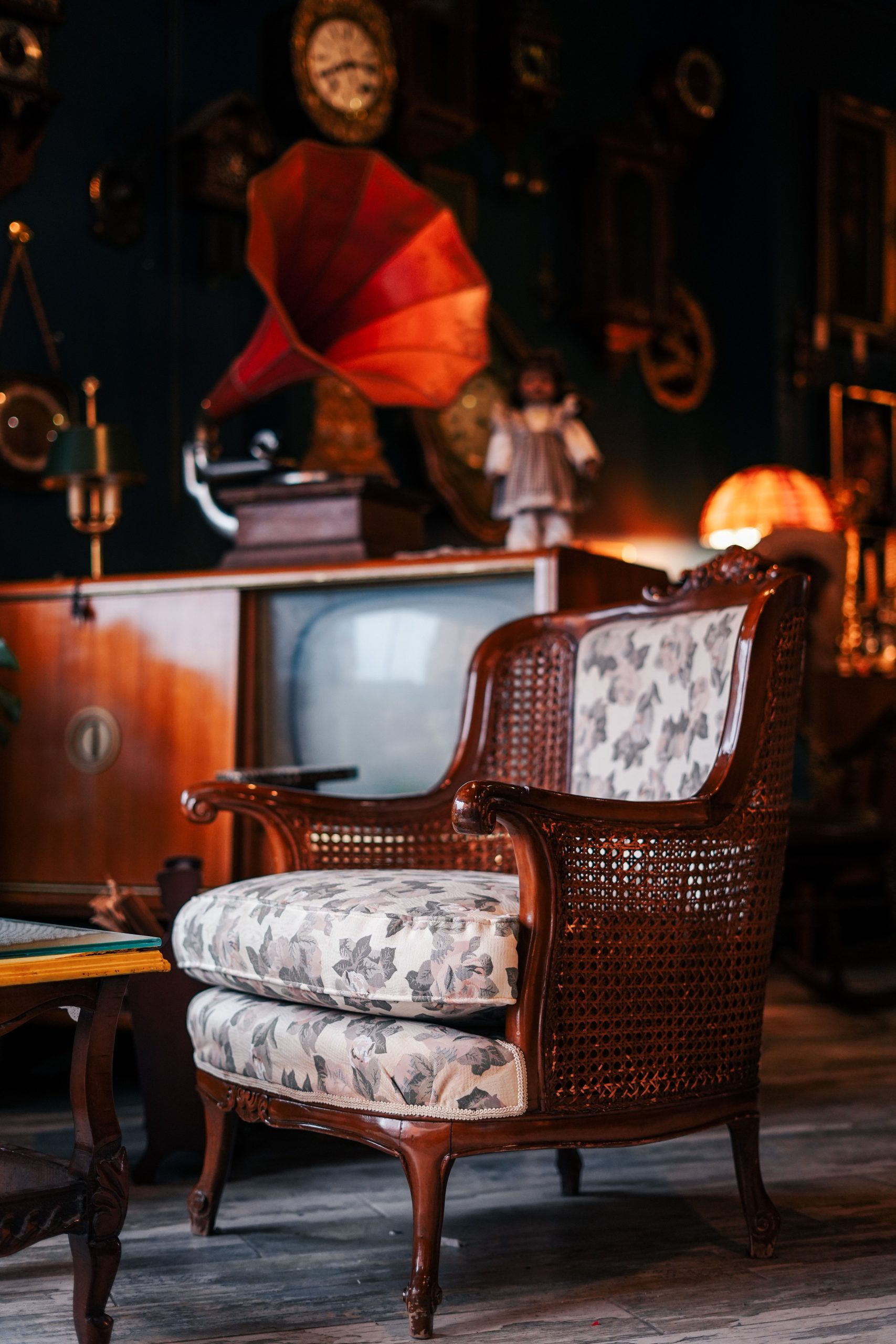 A vintage armchair in a cozy café setting with retro decor, ideal for nostalgia and design inspiration.